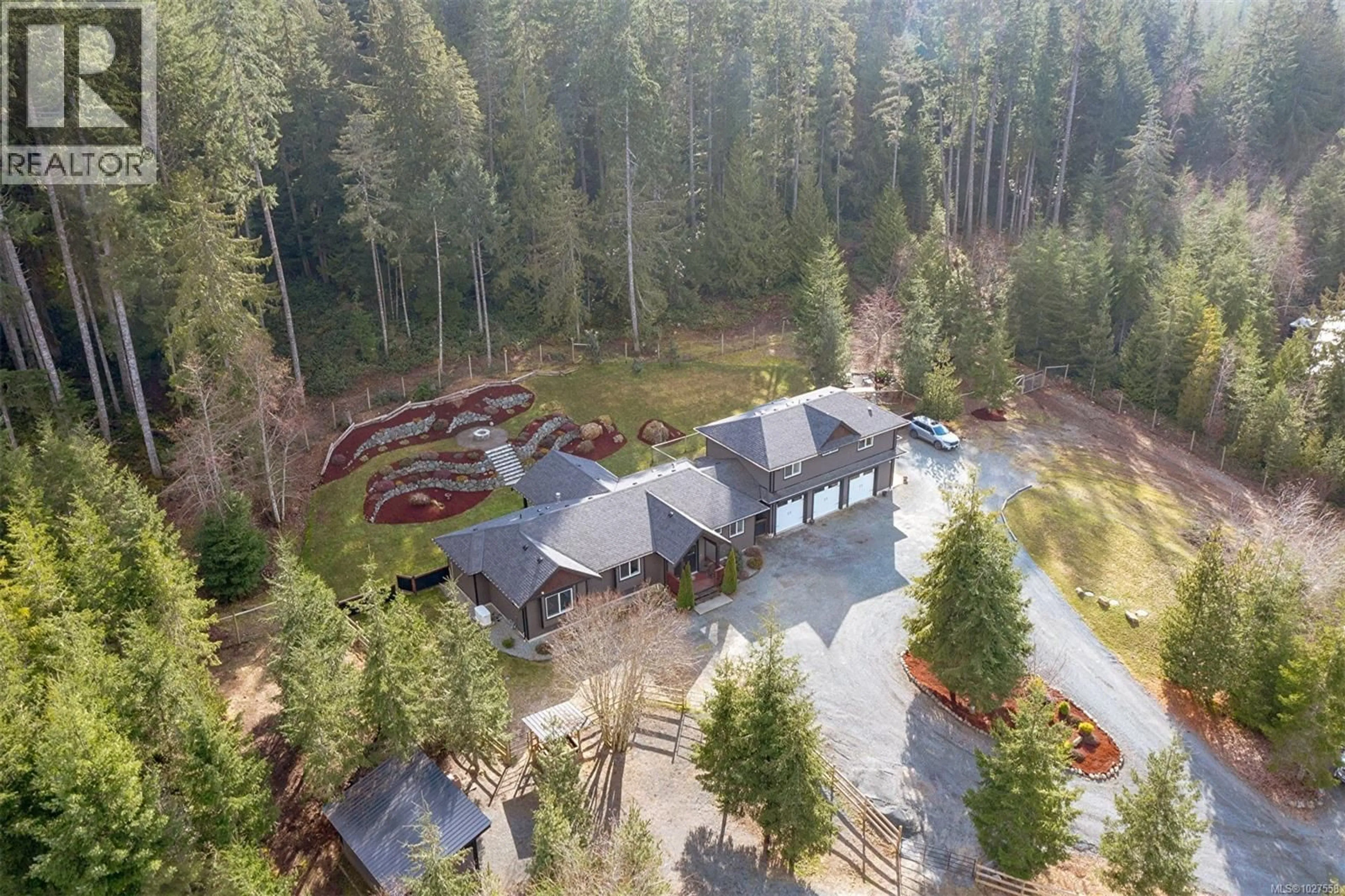 A pic from outside/outdoor area/front of a property/back of a property/a pic from drone, forest/trees view for 2840 WOODCROFT PLACE, Shawnigan Lake British Columbia V0R2W1