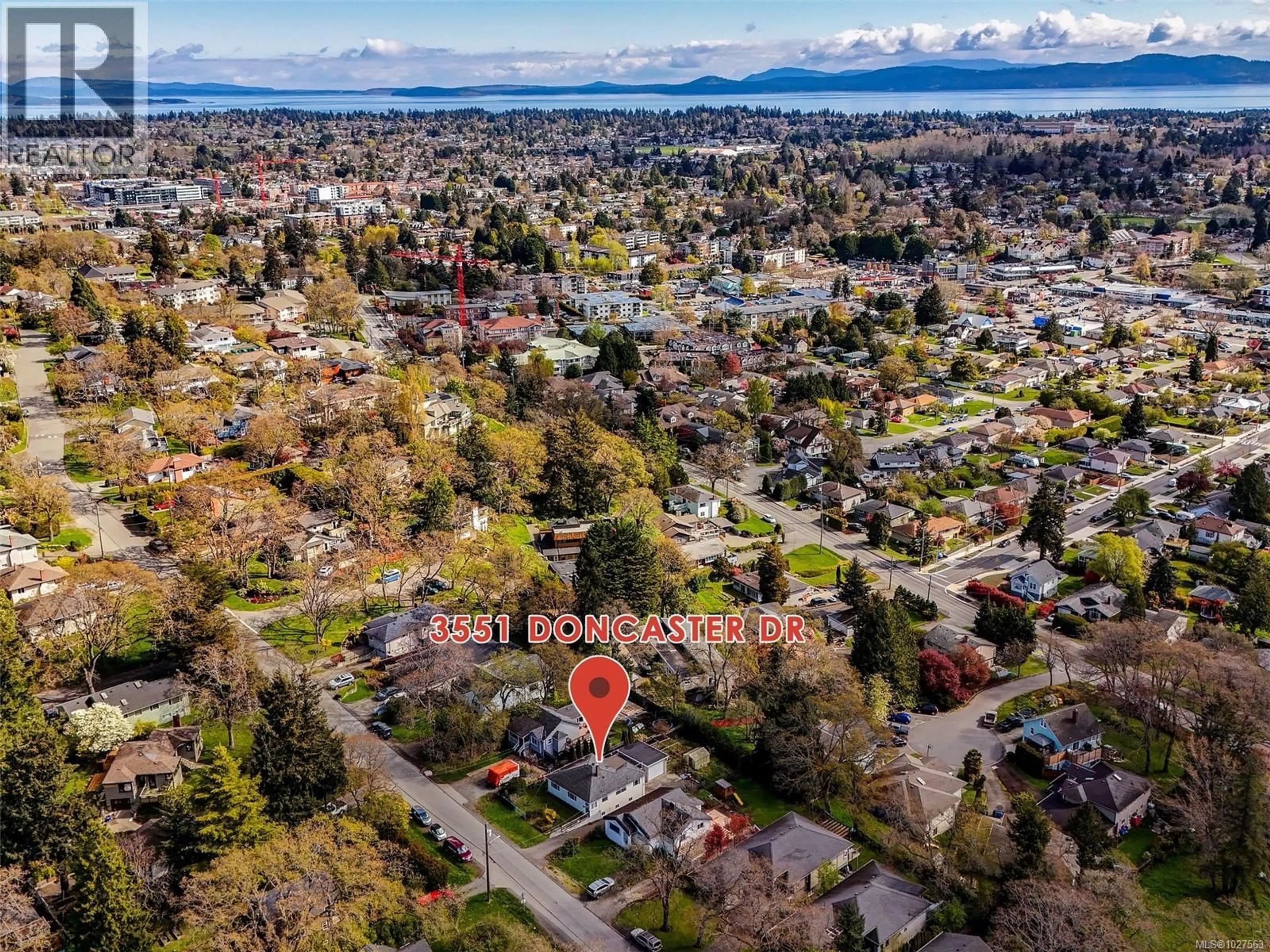 A pic from outside/outdoor area/front of a property/back of a property/a pic from drone, mountain view for 3551 DONCASTER DRIVE, Saanich British Columbia V8P3W2