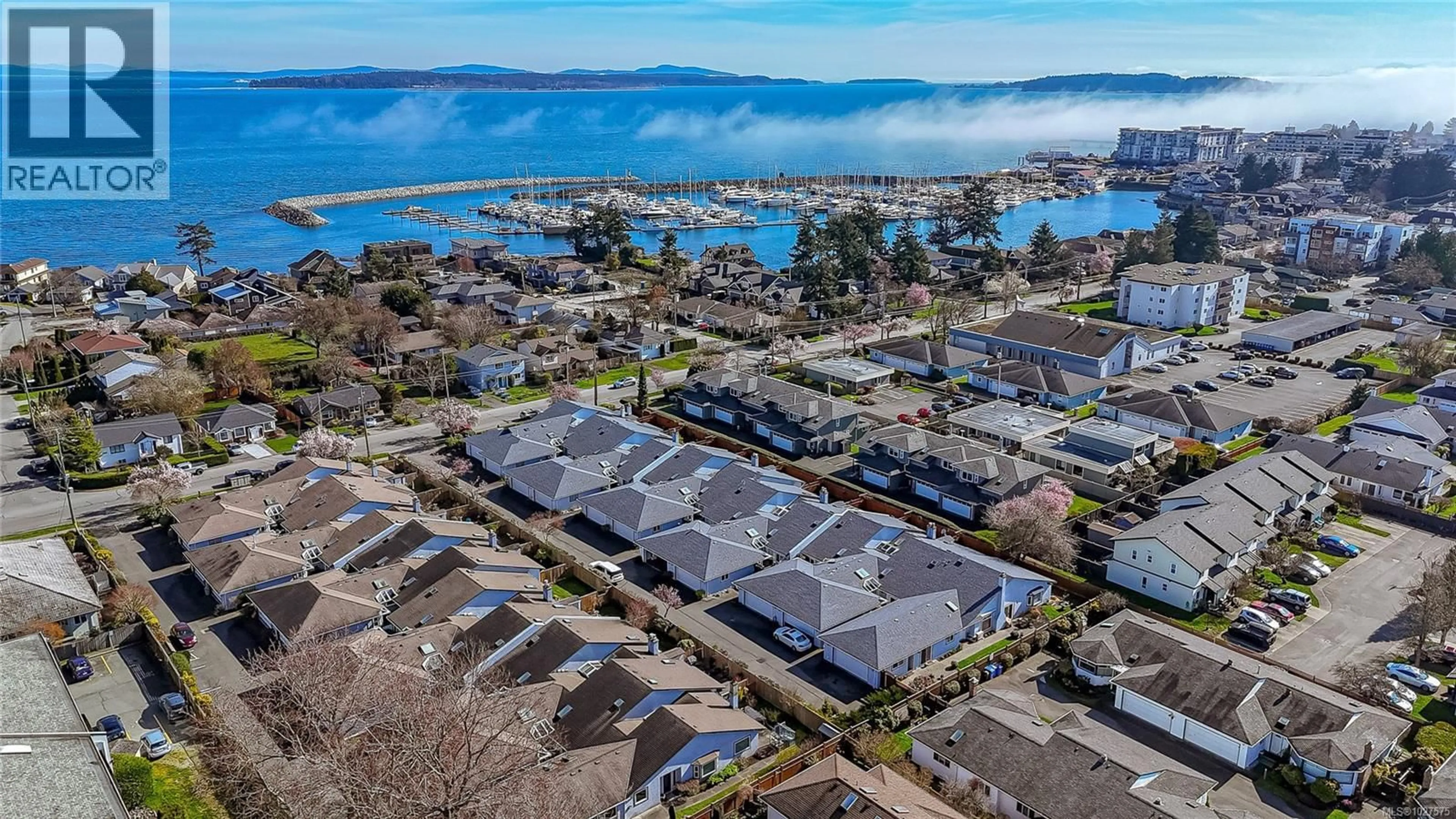 A pic from outside/outdoor area/front of a property/back of a property/a pic from drone, water/lake/river/ocean view for 5 - 10084 THIRD STREET, Sidney British Columbia V8L3B3