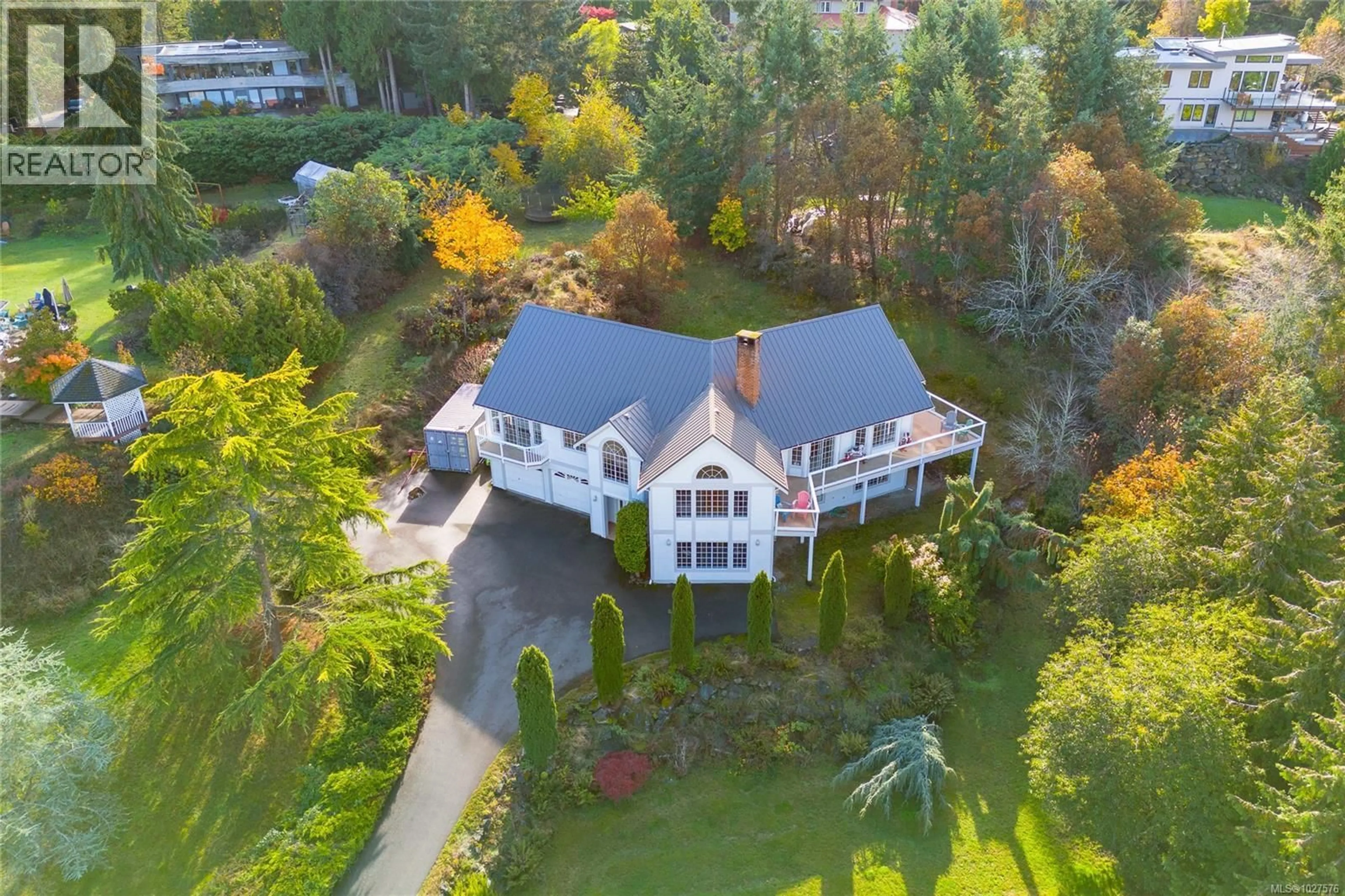 A pic from outside/outdoor area/front of a property/back of a property/a pic from drone, water/lake/river/ocean view for 11474 SUMAC DRIVE, North Saanich British Columbia V8L5J8