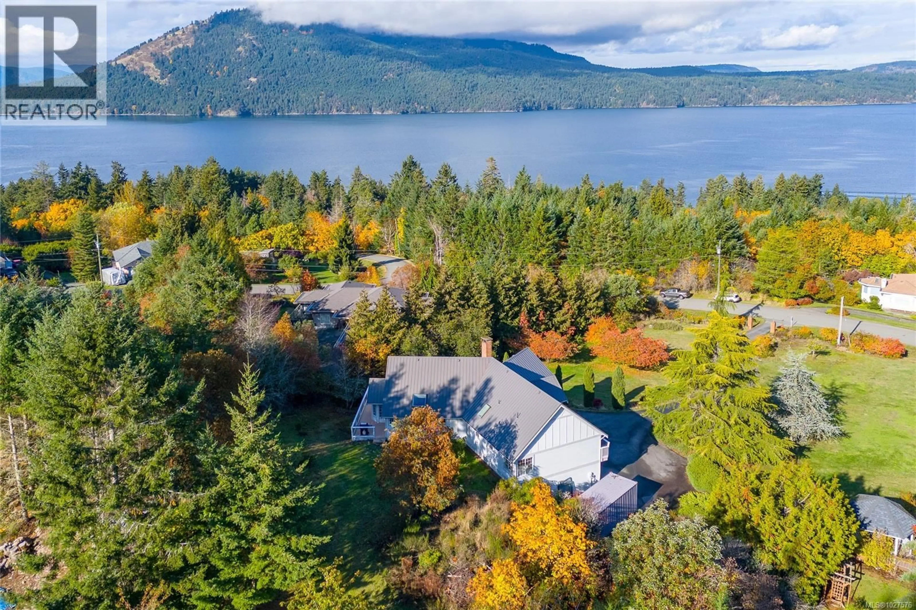 A pic from outside/outdoor area/front of a property/back of a property/a pic from drone, water/lake/river/ocean view for 11474 SUMAC DRIVE, North Saanich British Columbia V8L5J8