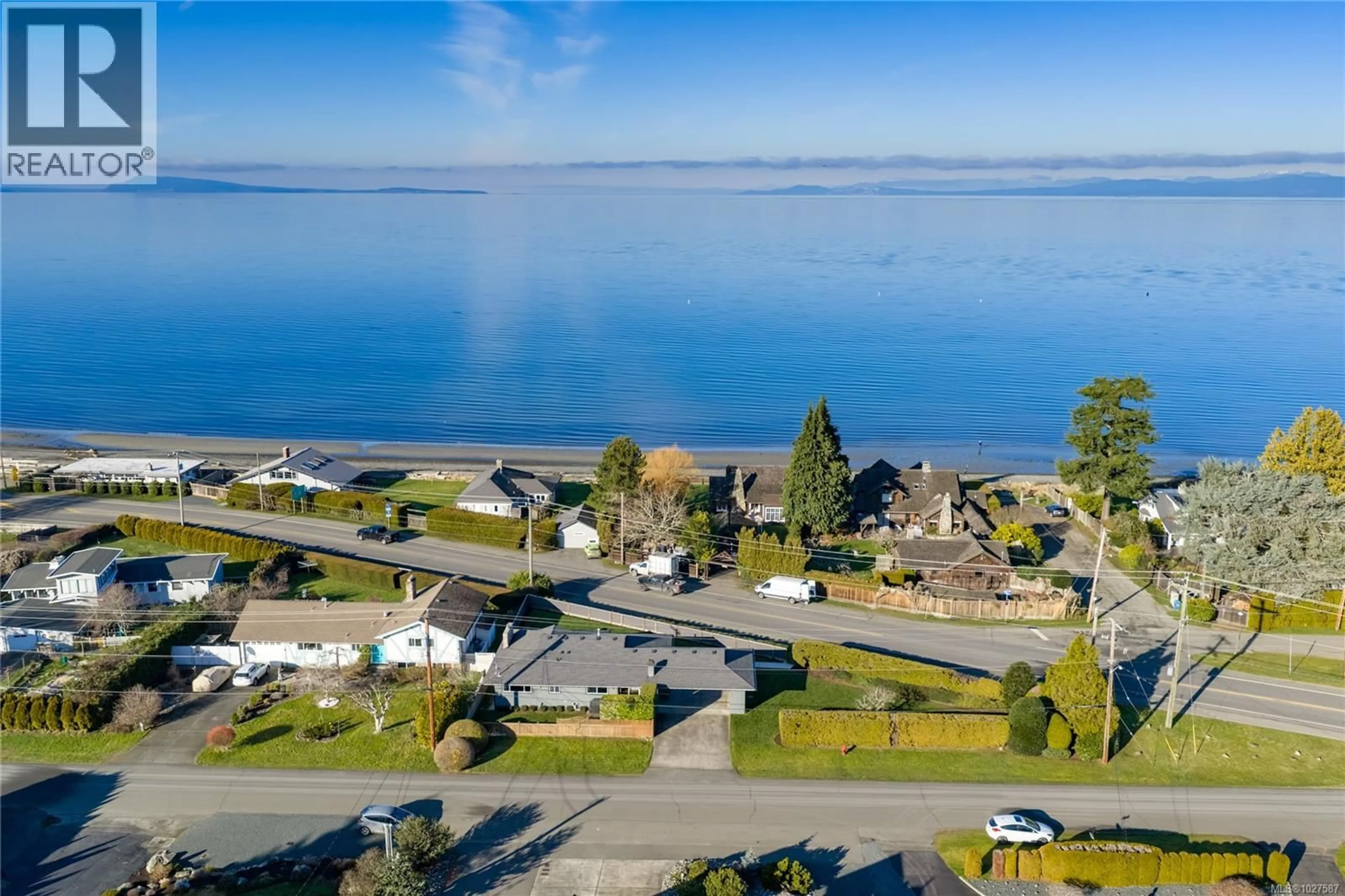 A pic from outside/outdoor area/front of a property/back of a property/a pic from drone, water/lake/river/ocean view for 245 ELIZABETH AVENUE, Qualicum Beach British Columbia V9K1G8