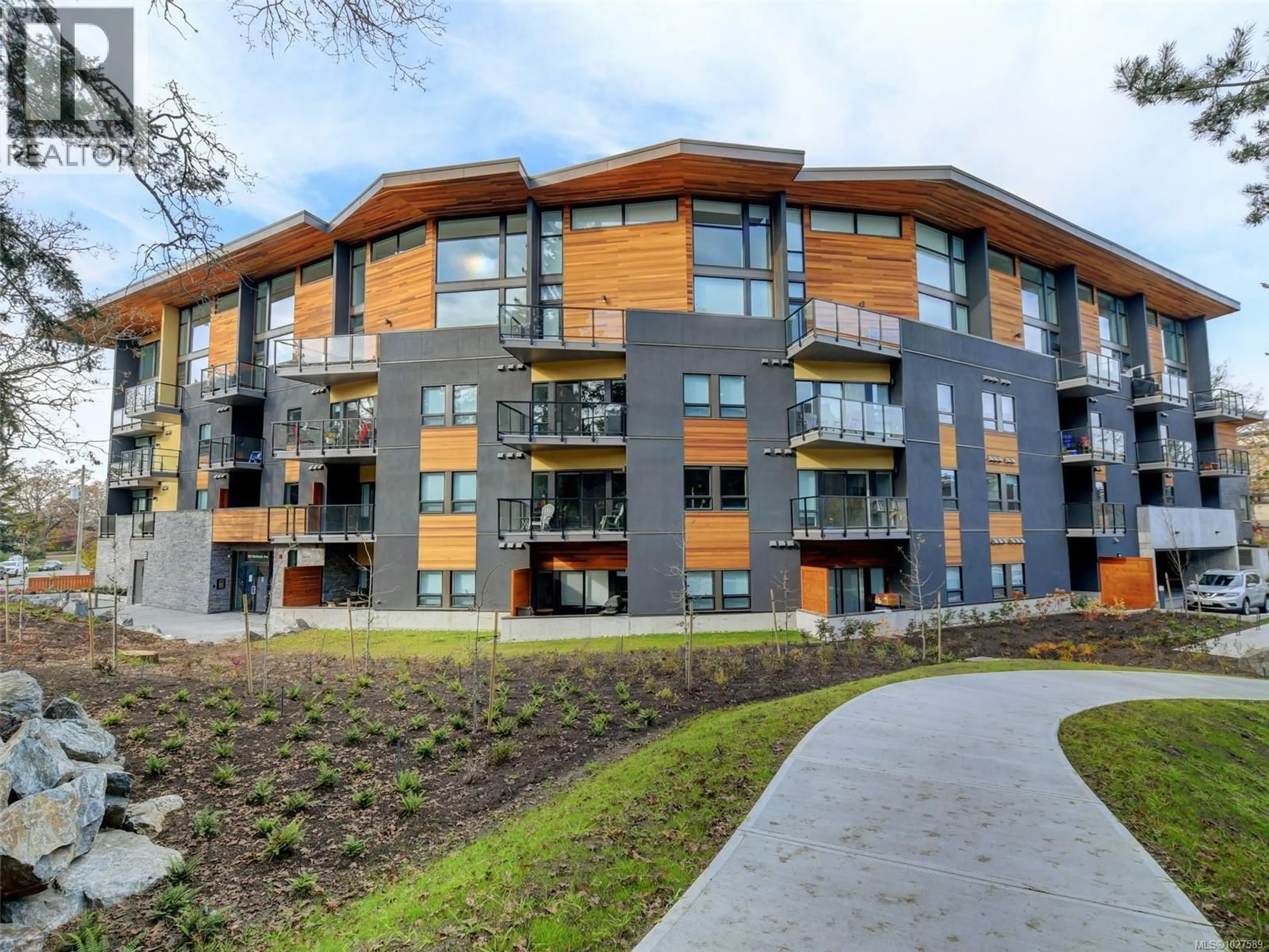 A pic from outside/outdoor area/front of a property/back of a property/a pic from drone, building for 101 - 991 MCKENZIE AVENUE, Saanich British Columbia V8X0B5