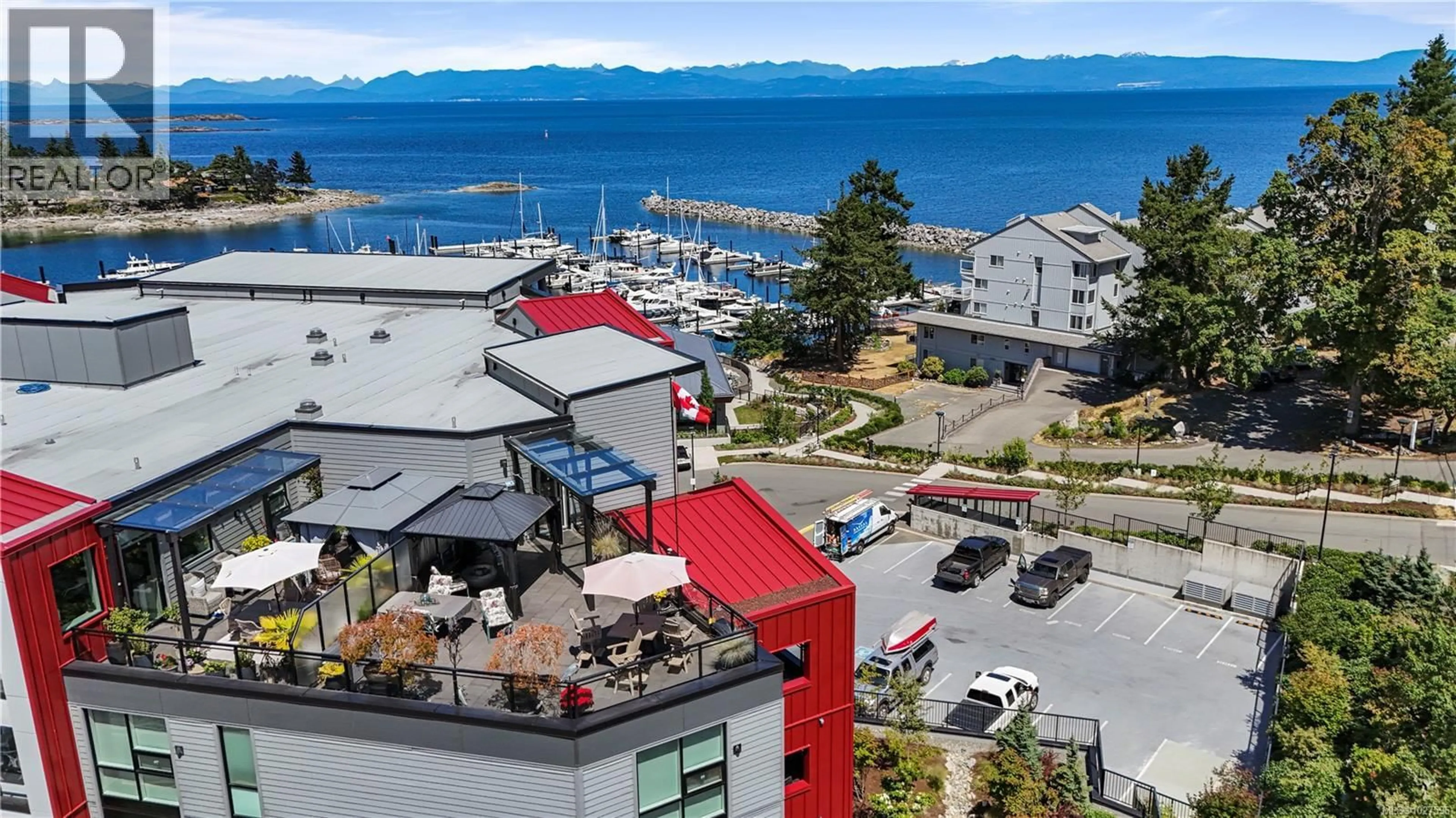 A pic from outside/outdoor area/front of a property/back of a property/a pic from drone, unknown for 604 - 3529 DOLPHIN DRIVE, Nanoose Bay British Columbia V9P9J7