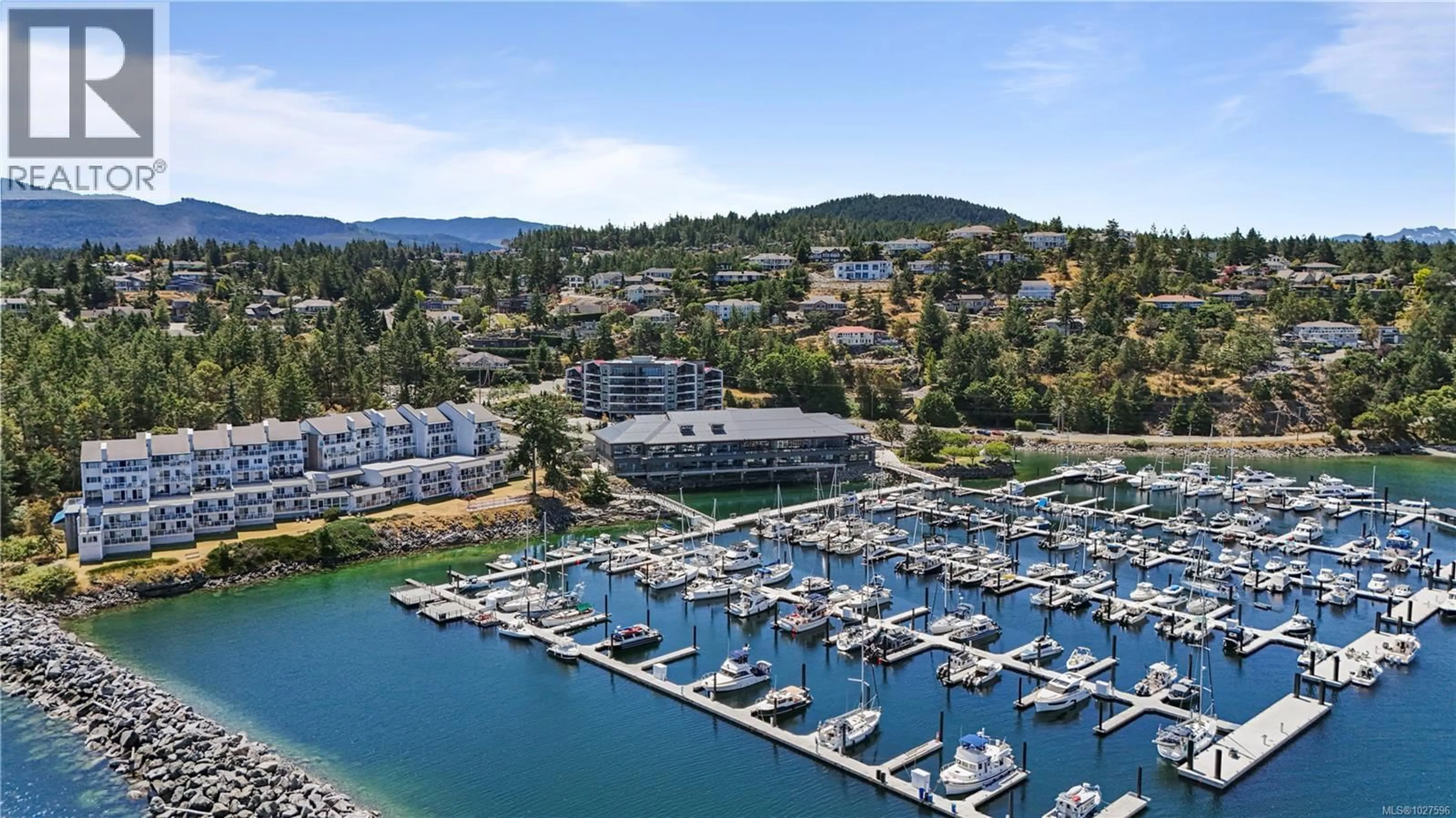 A pic from outside/outdoor area/front of a property/back of a property/a pic from drone, water/lake/river/ocean view for 604 - 3529 DOLPHIN DRIVE, Nanoose Bay British Columbia V9P9J7