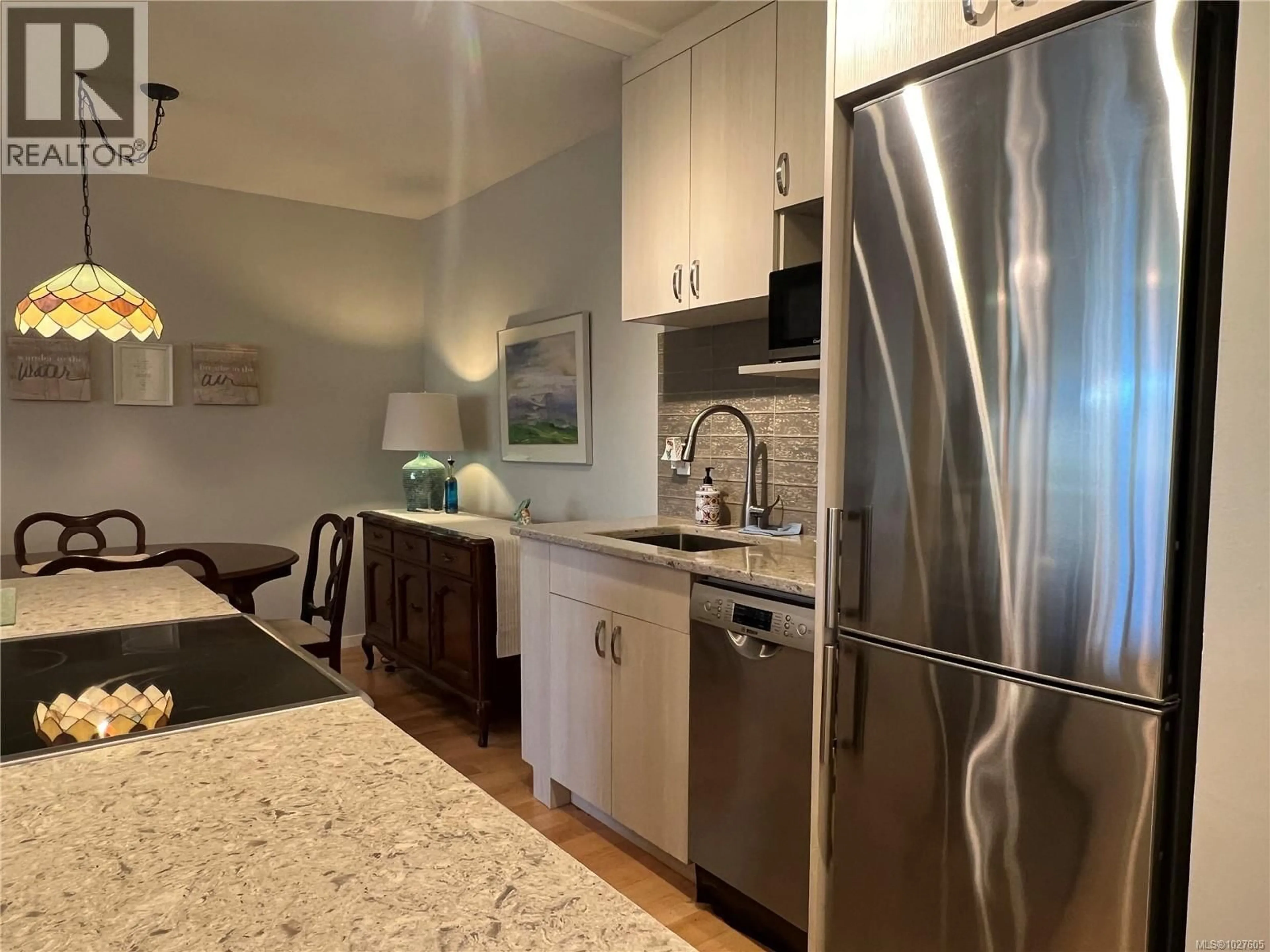 Open concept kitchen, unknown for 404 - 3170 IRMA STREET SOUTH, Victoria British Columbia V9A1S8