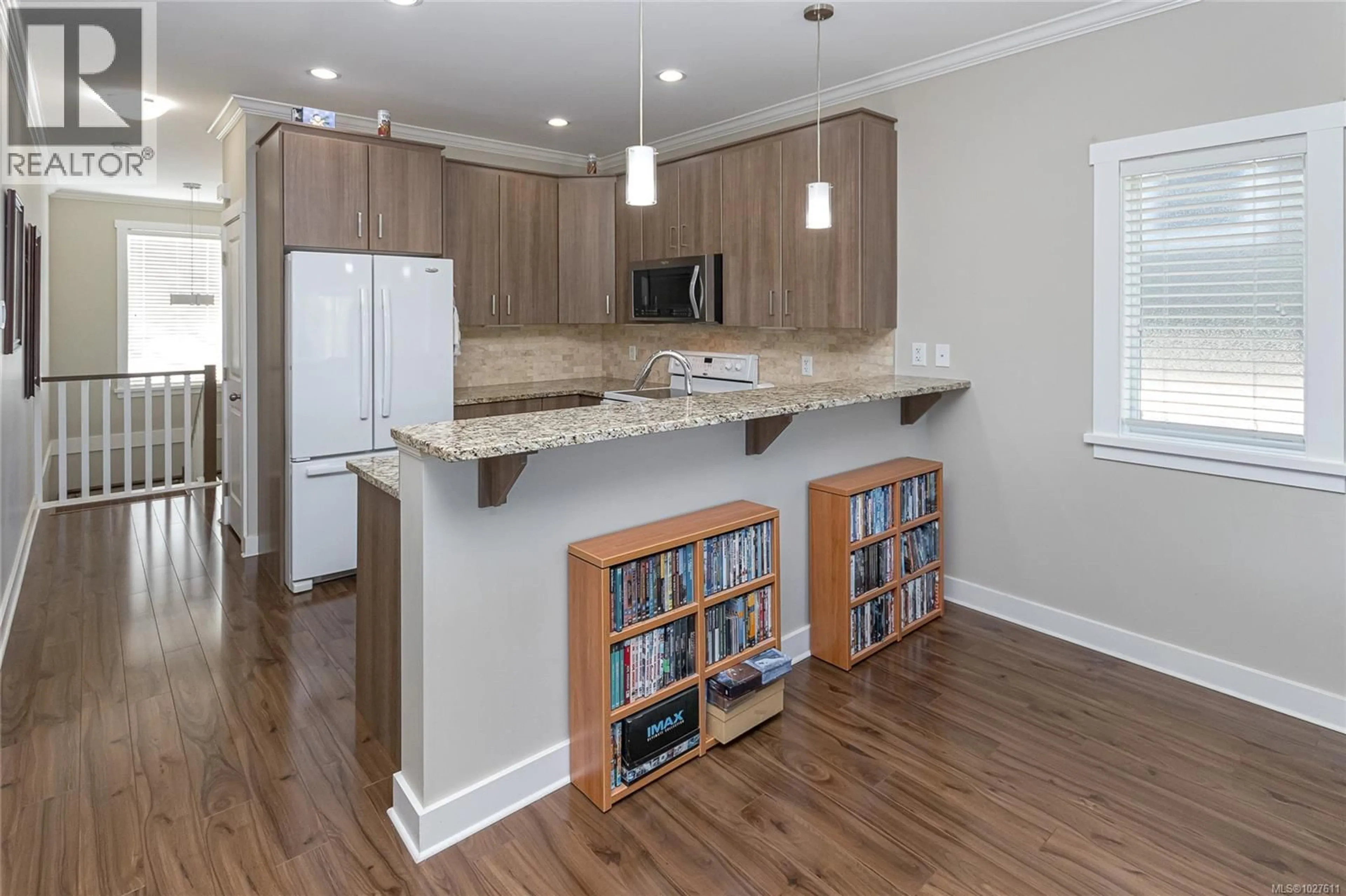 Open concept kitchen, wood/laminate floor for 1318 ARTESIAN COURT, Langford British Columbia V9B0L9