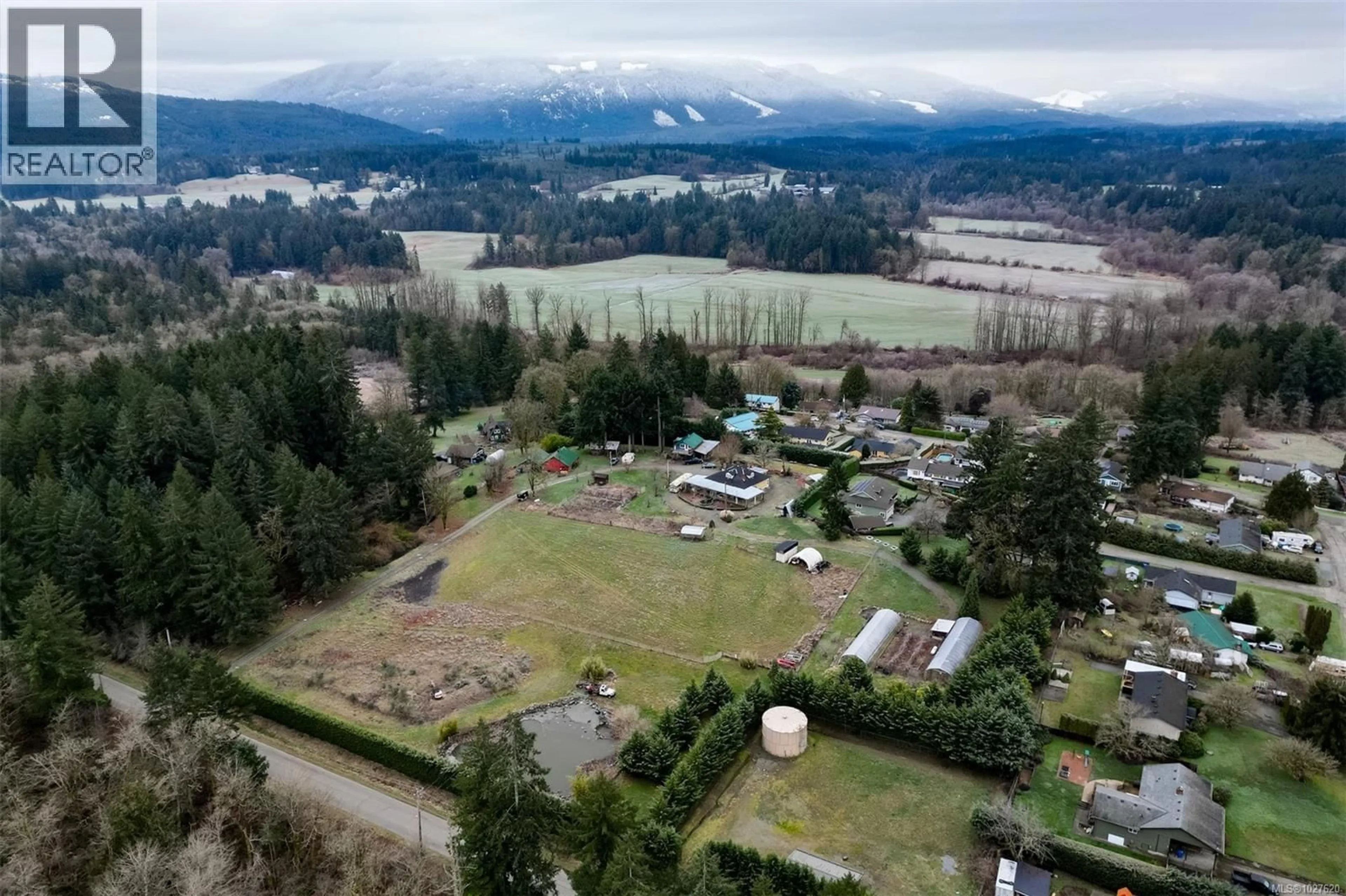A pic from outside/outdoor area/front of a property/back of a property/a pic from drone, mountain view for 4890 WILSON ROAD, Duncan British Columbia V9L6L5