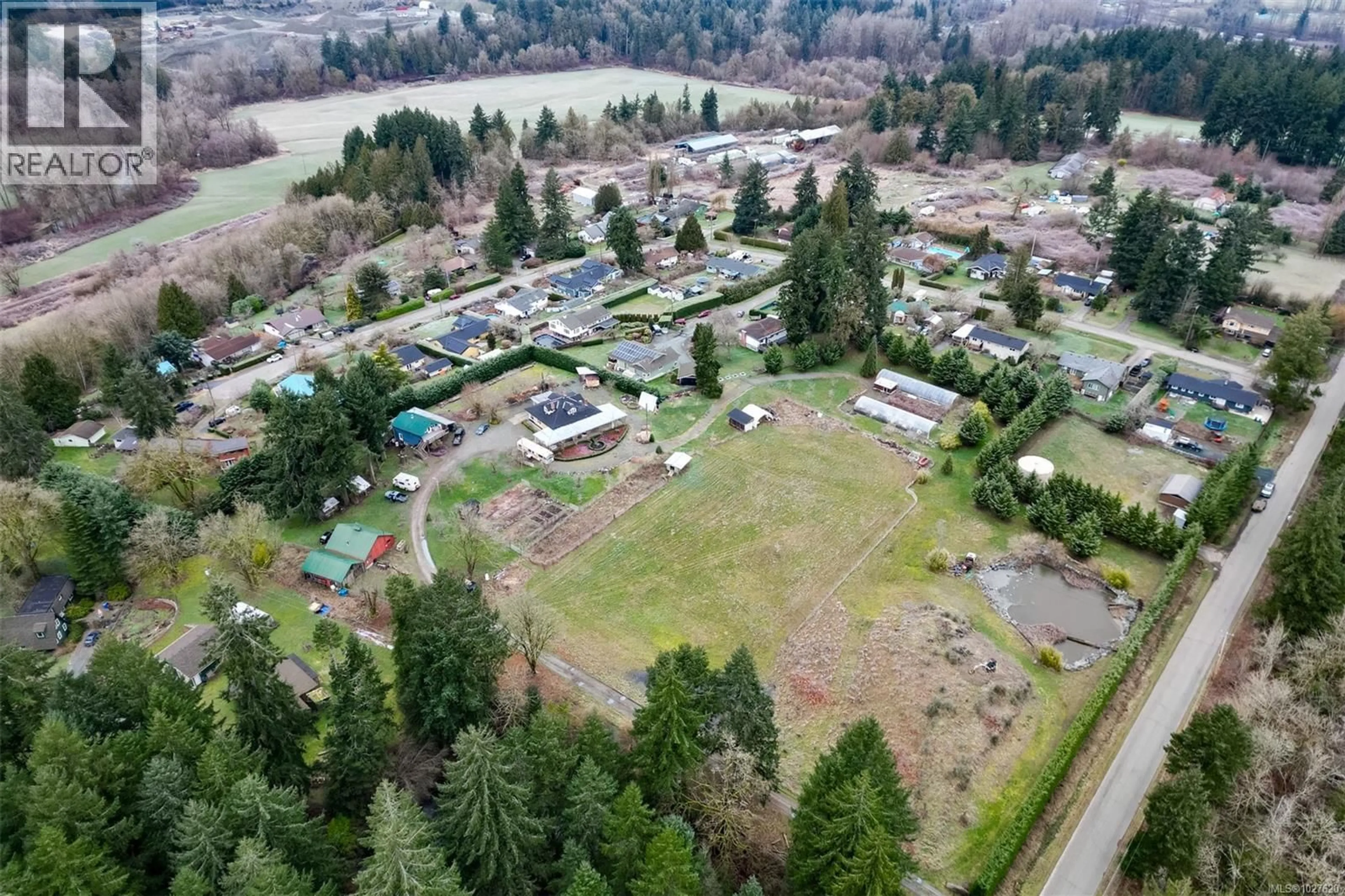 A pic from outside/outdoor area/front of a property/back of a property/a pic from drone, mountain view for 4890 WILSON ROAD, Duncan British Columbia V9L6L5