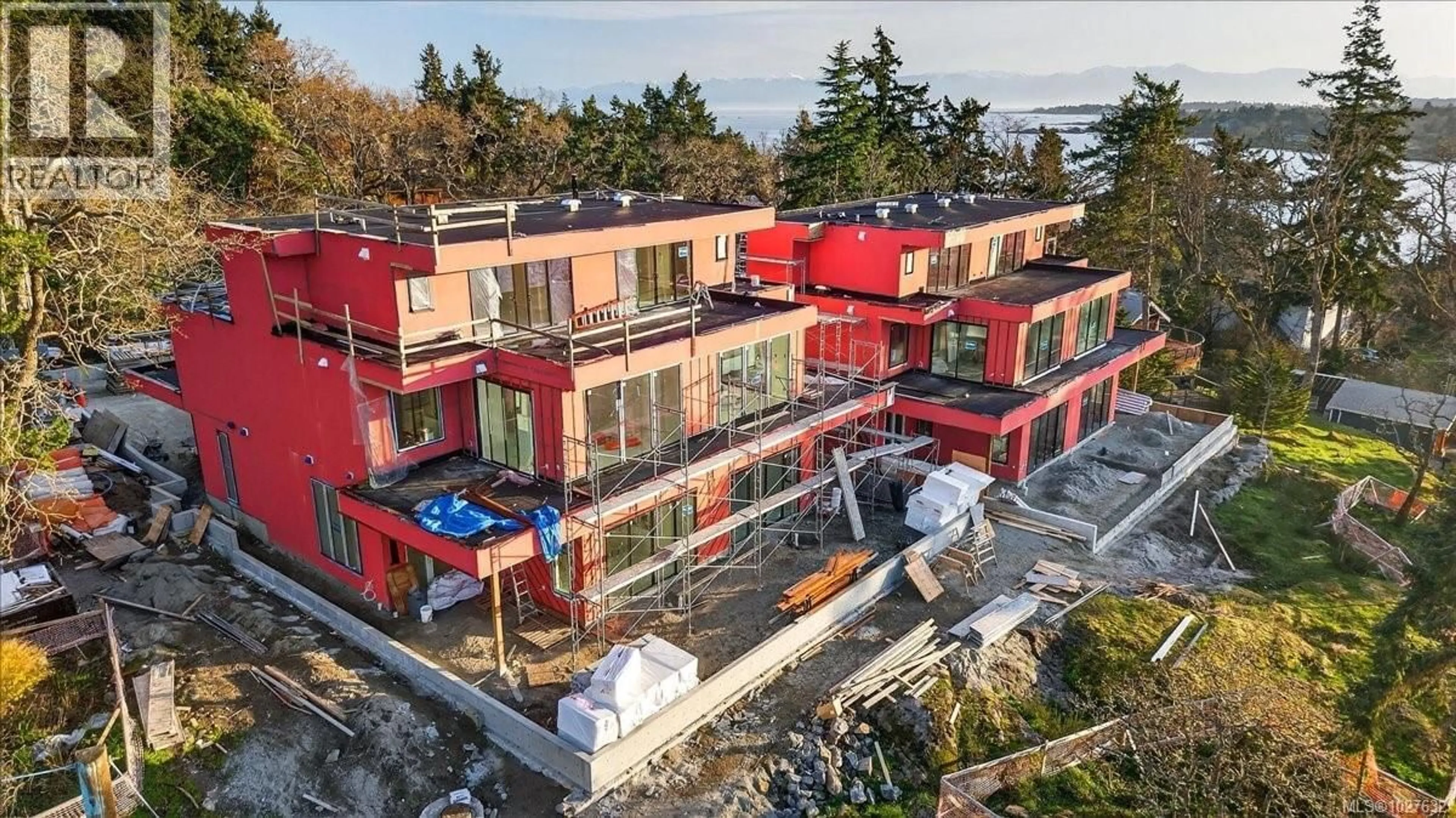 A pic from outside/outdoor area/front of a property/back of a property/a pic from drone, building for 2 - 2737 TUDOR AVENUE, Saanich British Columbia V8N1L6