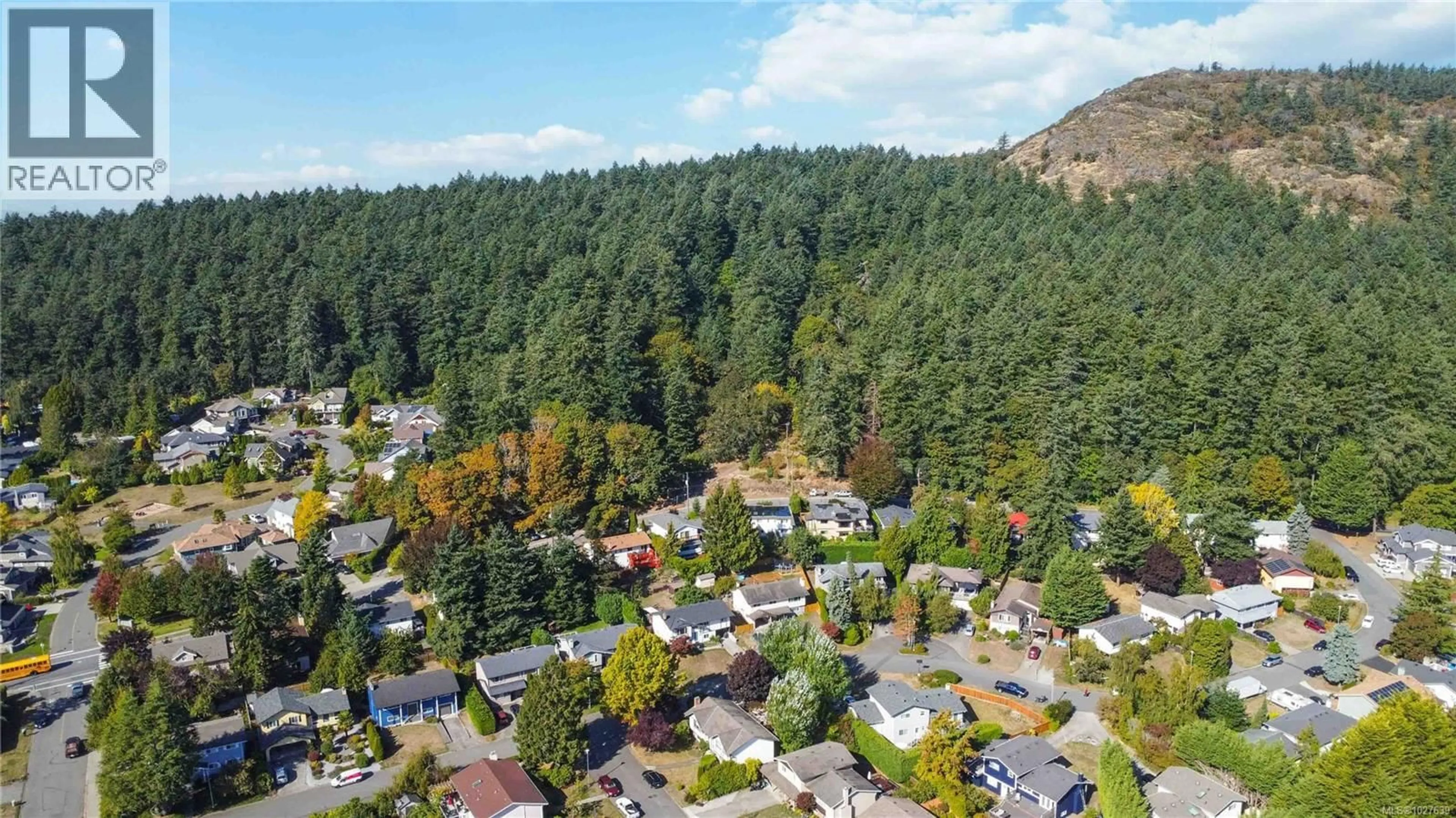 A pic from outside/outdoor area/front of a property/back of a property/a pic from drone, mountain view for 4370 ELNIDO CRESCENT, Saanich British Columbia V8N4Z6