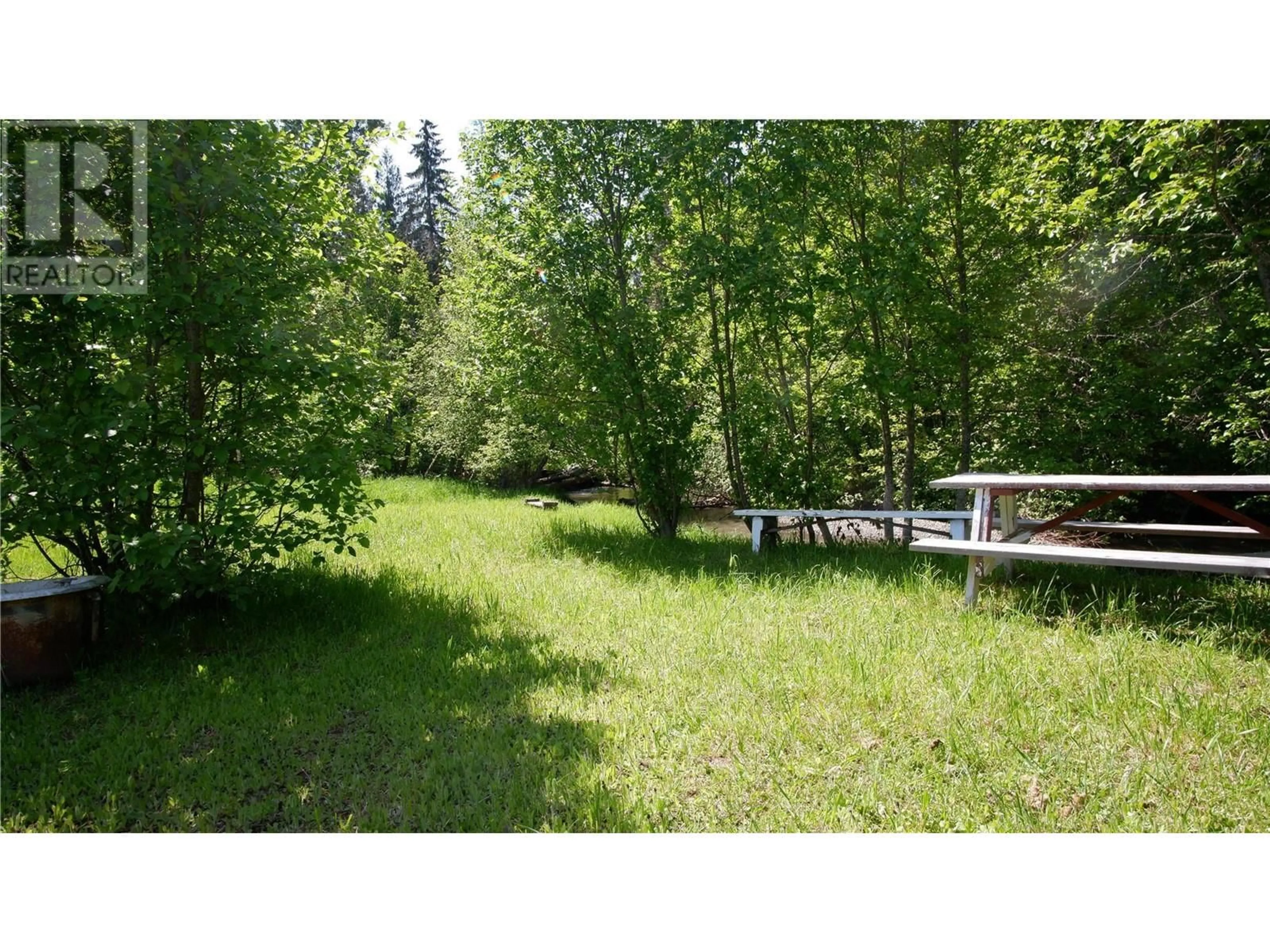 Patio, the fenced backyard for 2410 Trinity Valley Road, Enderby British Columbia V0E1V5