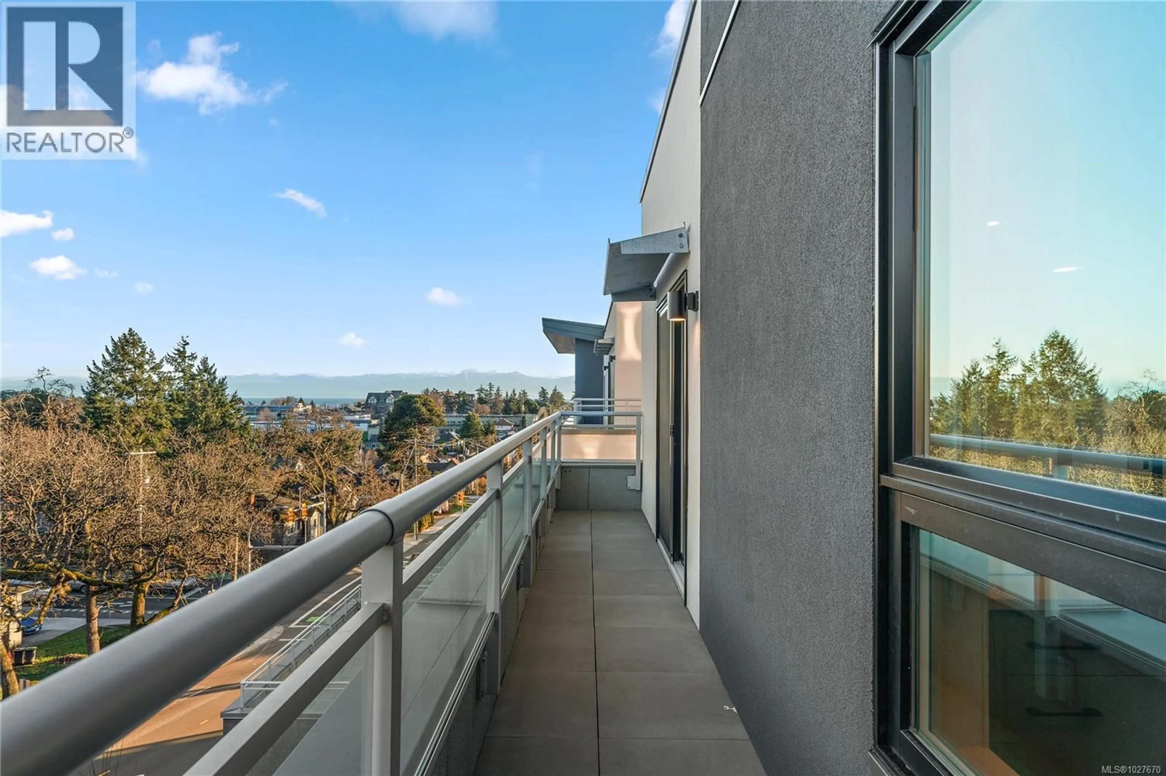 Balcony in the apartment, city buildings view from balcony for 507 - 610 LAMPSON STREET, Esquimalt British Columbia V9A0L4