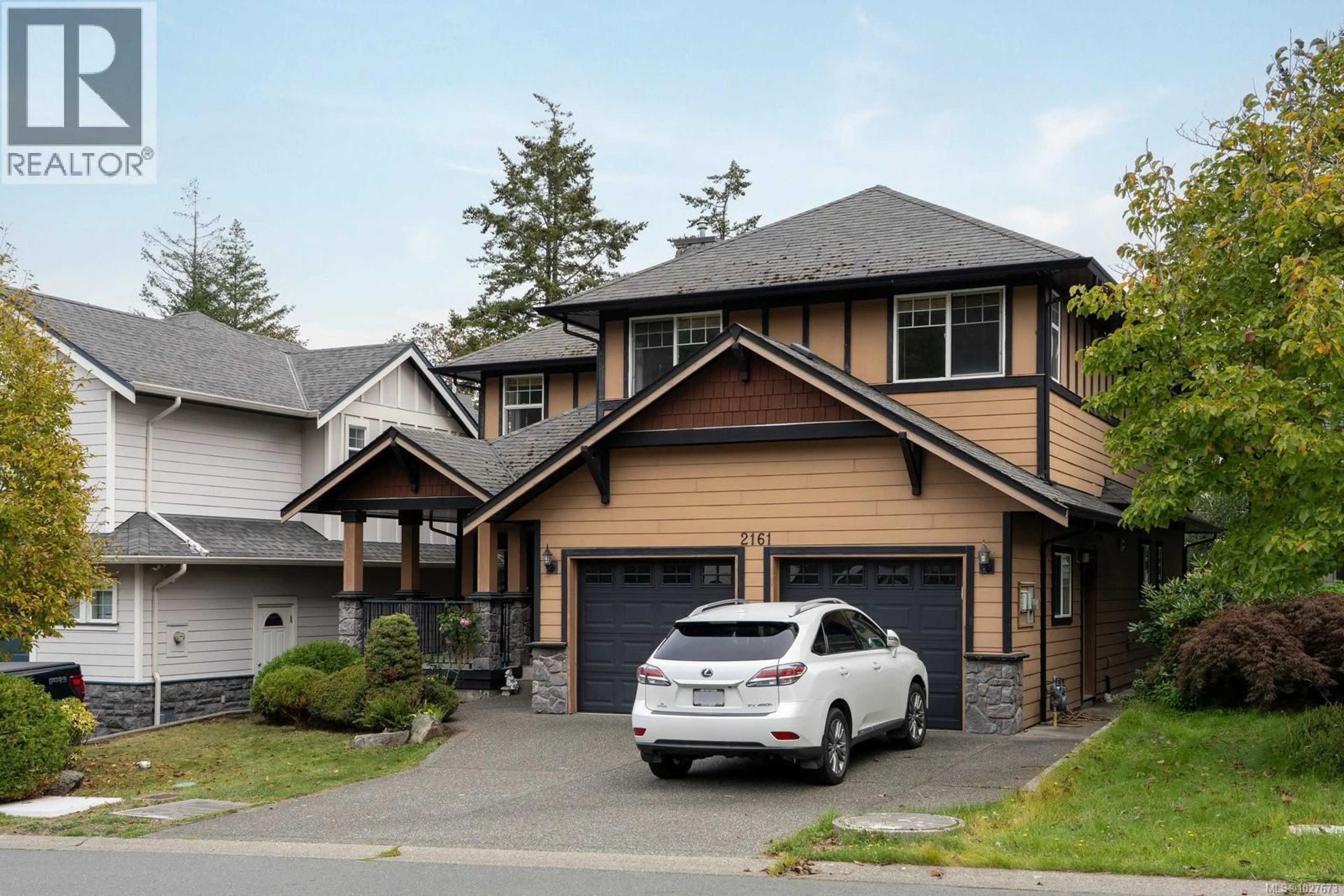 Home with vinyl exterior material, street for 2161 STONE GATE, Langford British Columbia V9B6R5