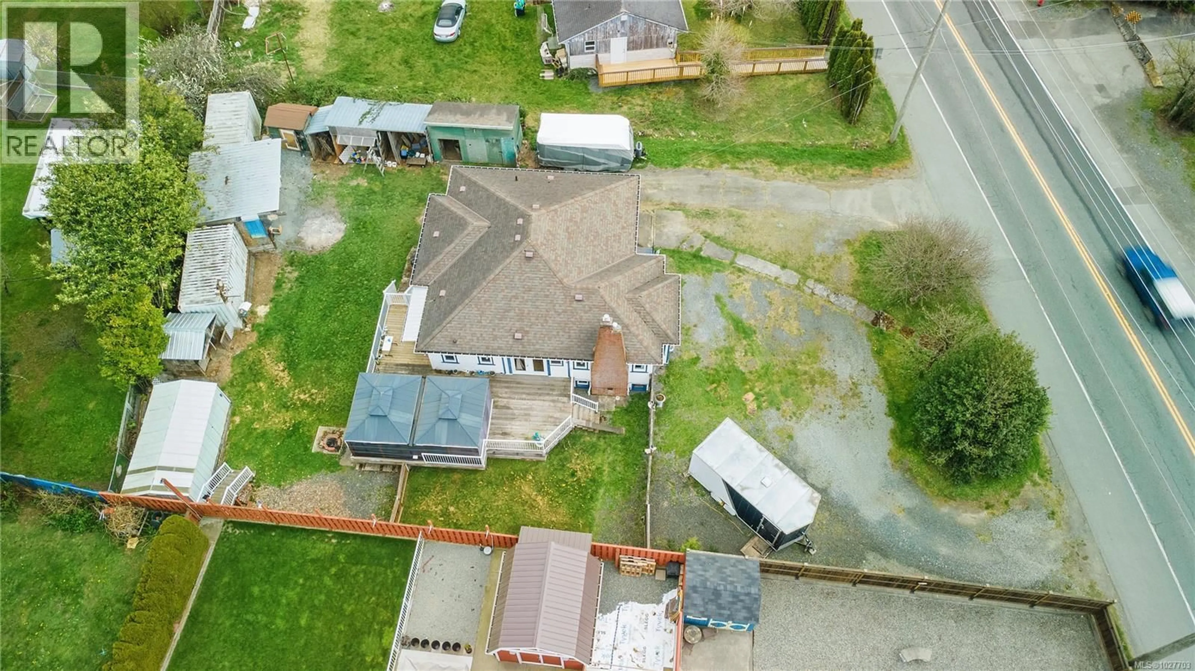 A pic from outside/outdoor area/front of a property/back of a property/a pic from drone, street for 6484 SOOKE ROAD, Sooke British Columbia V0S1N0