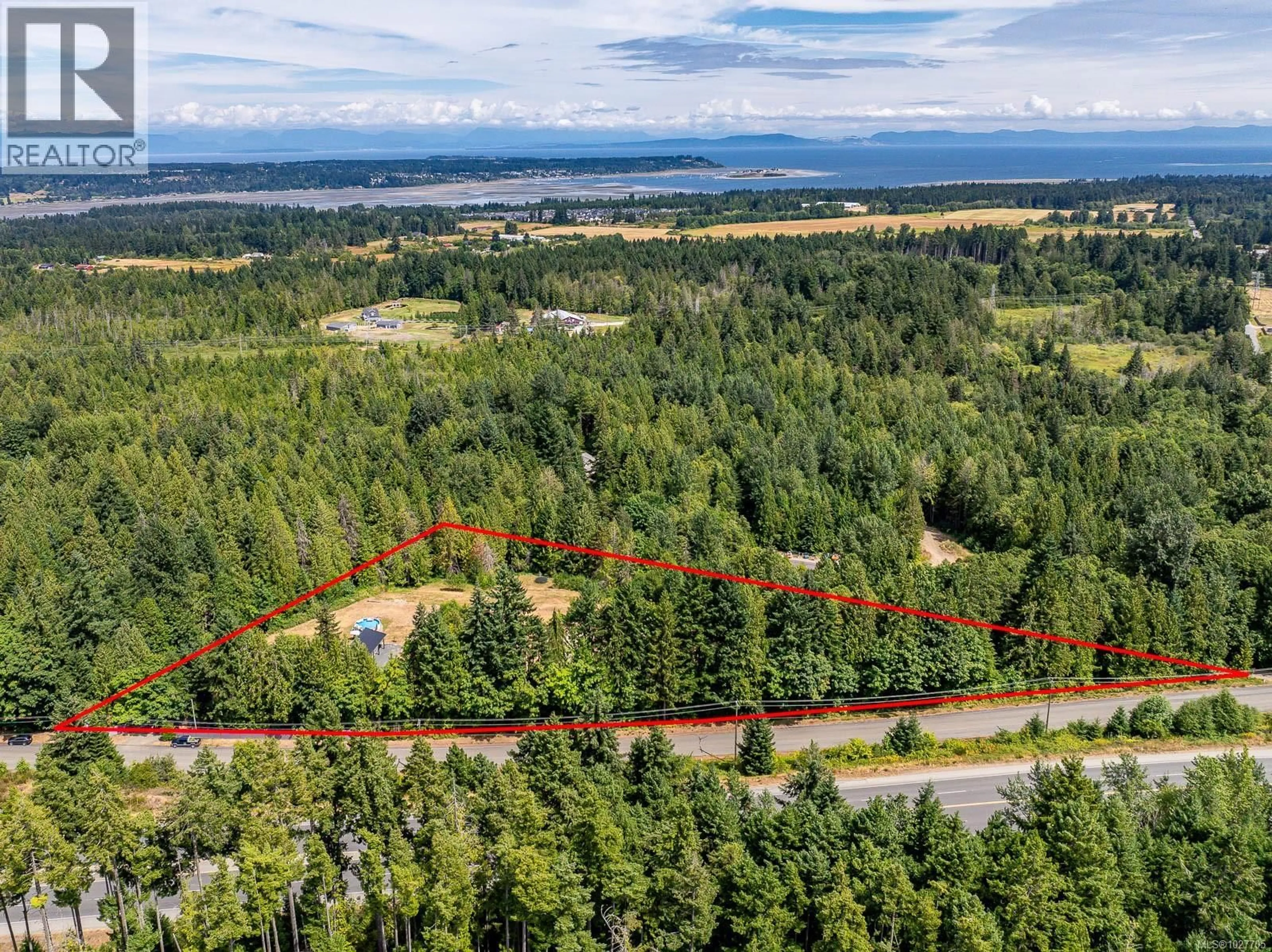 A pic from outside/outdoor area/front of a property/back of a property/a pic from drone, forest/trees view for 3840 SMALL ROAD, Courtenay British Columbia V9N3Z8