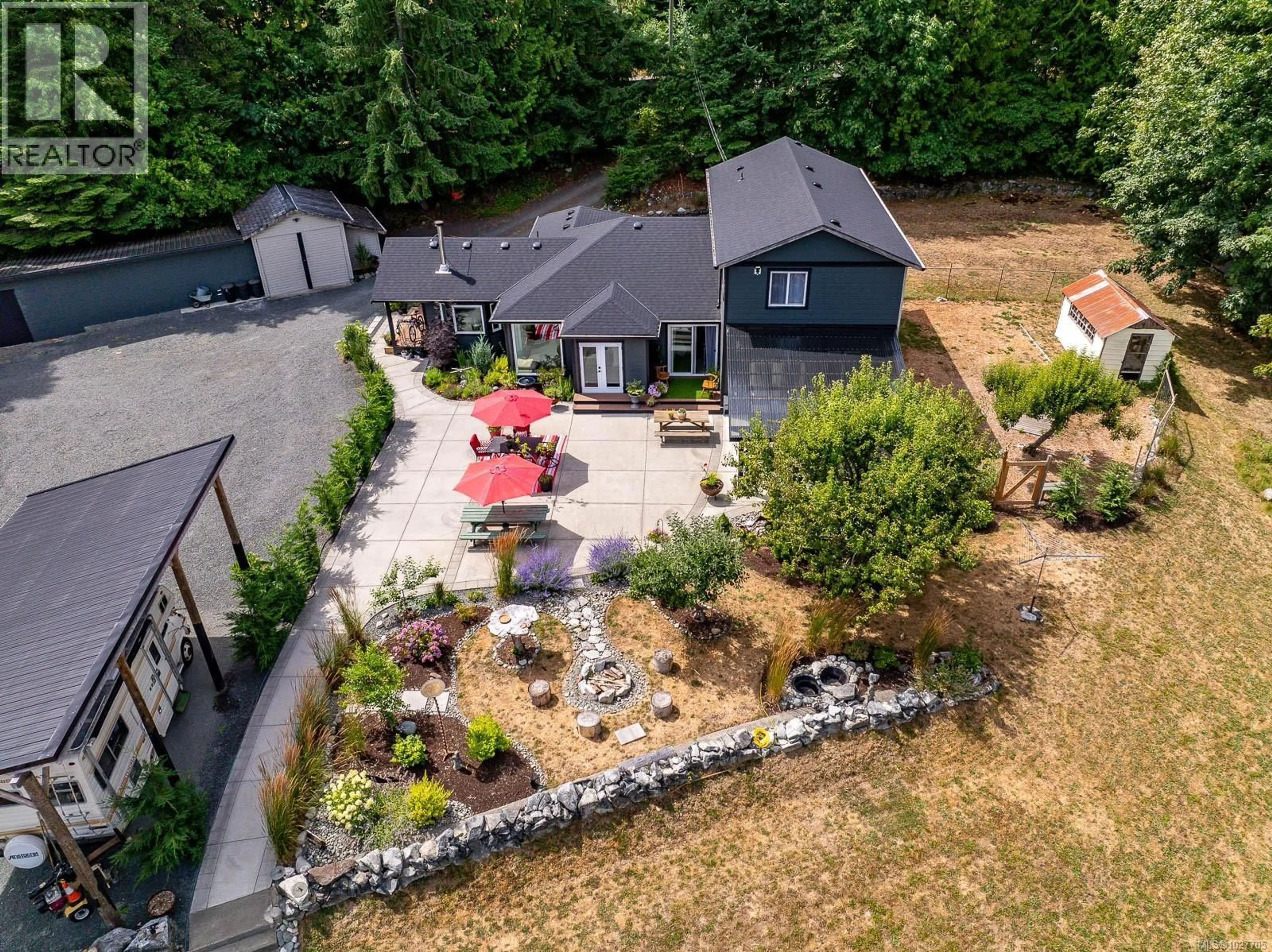 A pic from outside/outdoor area/front of a property/back of a property/a pic from drone, mountain view for 3840 SMALL ROAD, Courtenay British Columbia V9N3Z8