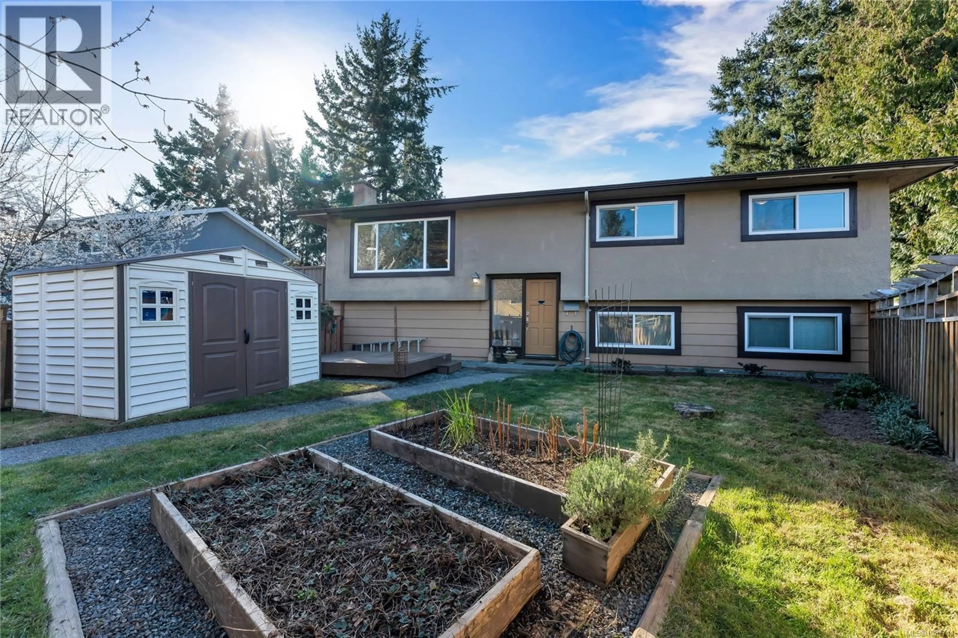 Home with vinyl exterior material, street for 1 - 2011 COURSER DRIVE, Sidney British Columbia V8L2N5