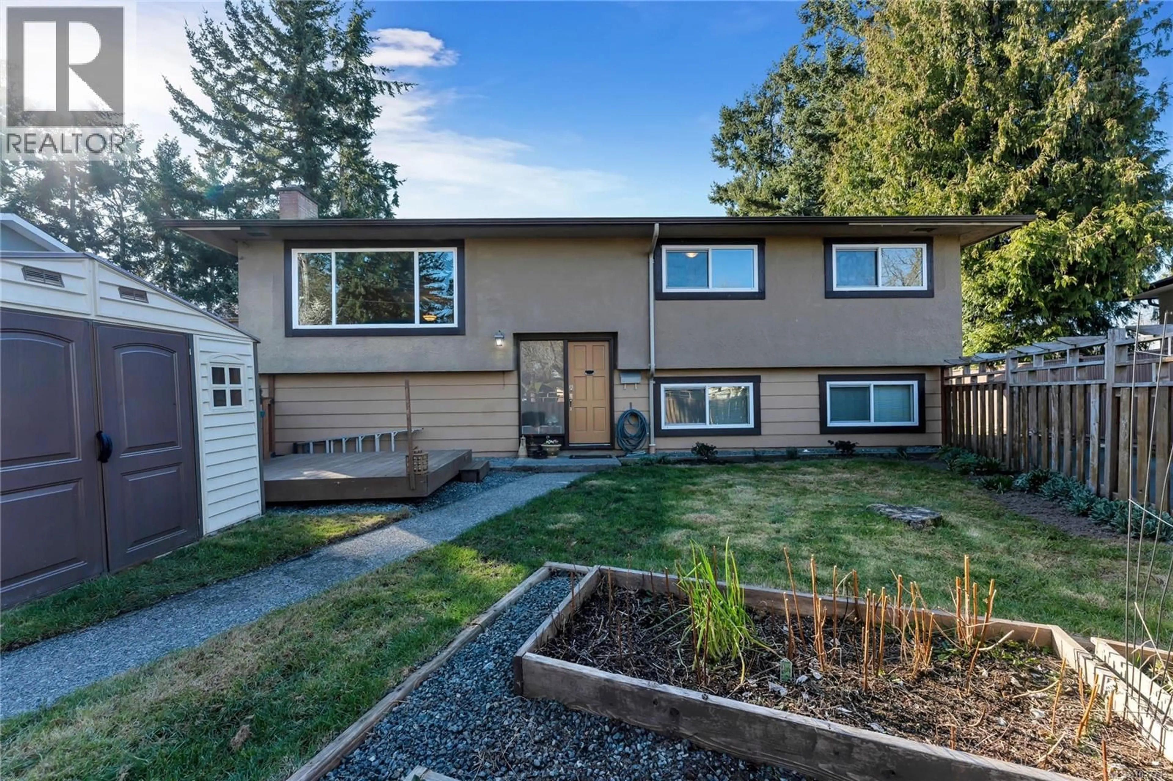 Home with vinyl exterior material, street for 1 - 2011 COURSER DRIVE, Sidney British Columbia V8L2N5