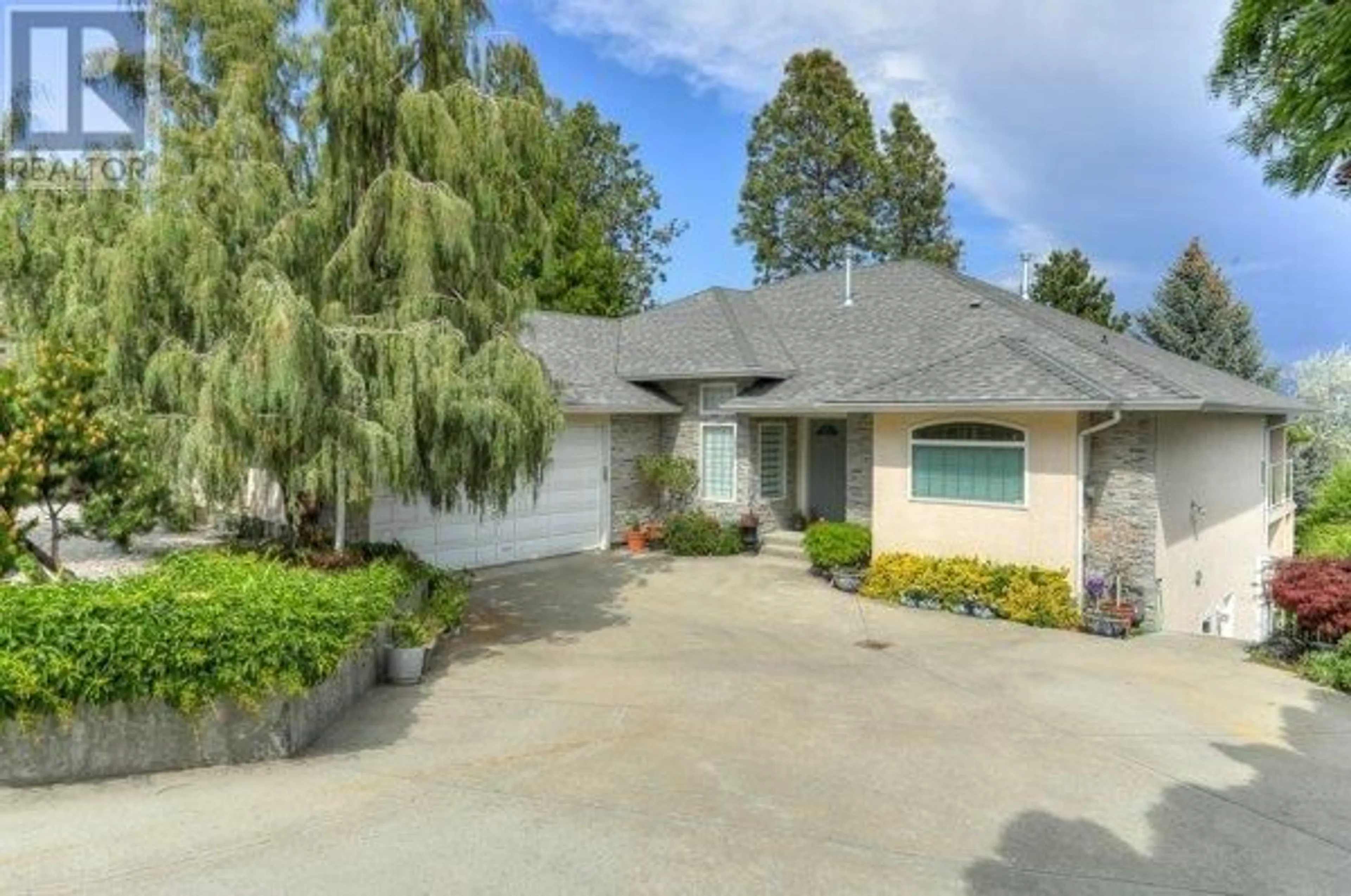 Frontside or backside of a home for 3547 Royal Gala Drive, West Kelowna British Columbia V4T2M4