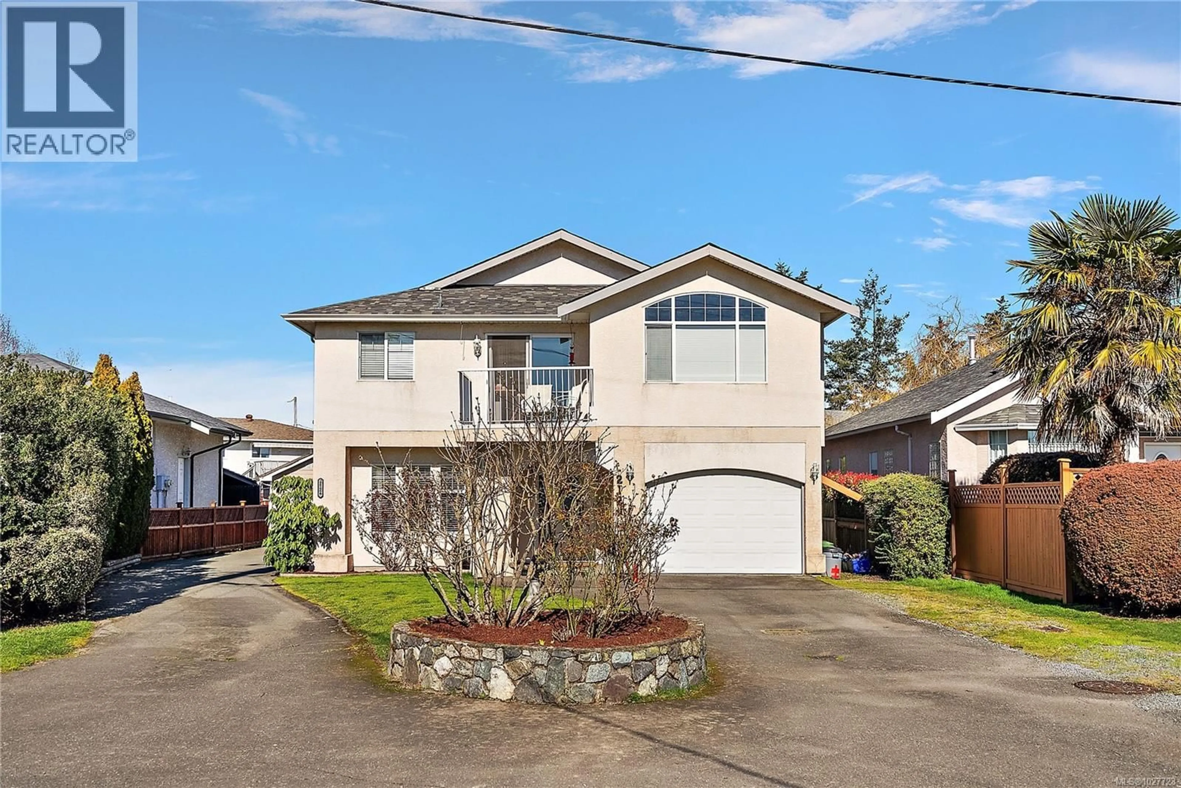 Home with vinyl exterior material, street for 2124 JAMES WHITE BOULEVARD WEST, Sidney British Columbia V8L1Z2