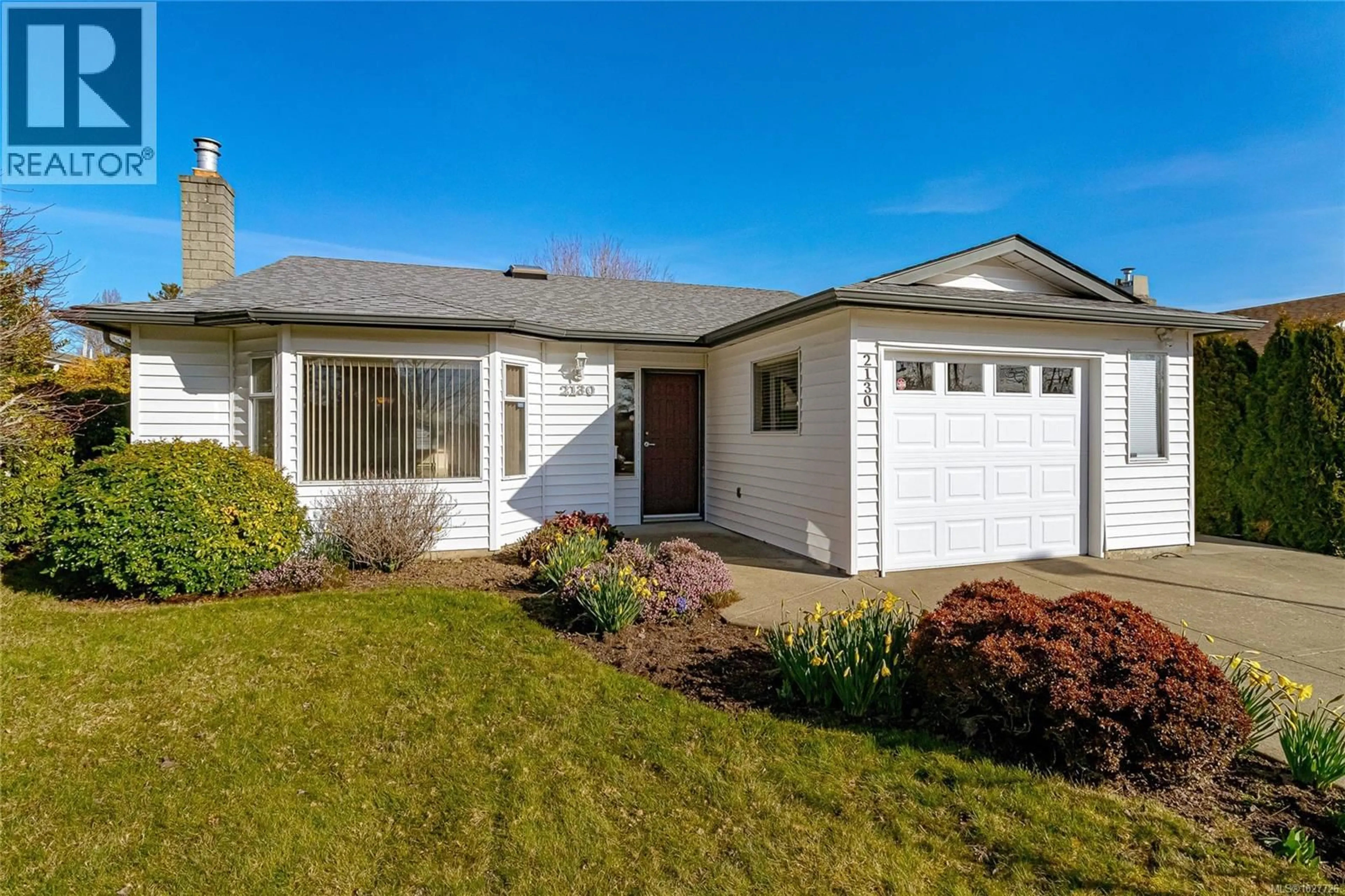 Home with vinyl exterior material, street for 2130 JAHN PLACE, Sidney British Columbia V8L5B9