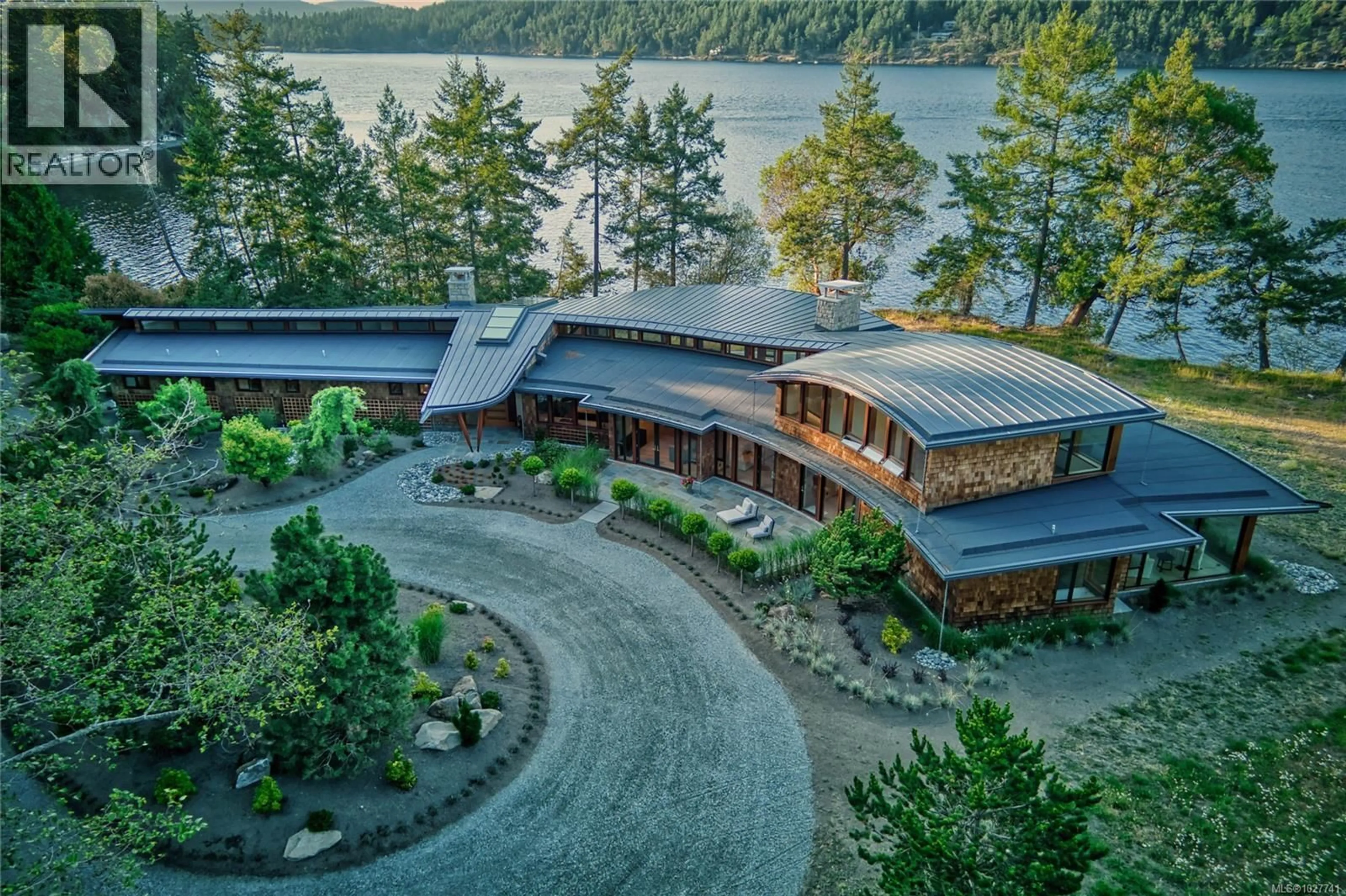A pic from outside/outdoor area/front of a property/back of a property/a pic from drone, water/lake/river/ocean view for 3200 CLAM BAY ROAD, Pender Island British Columbia V0M2M1