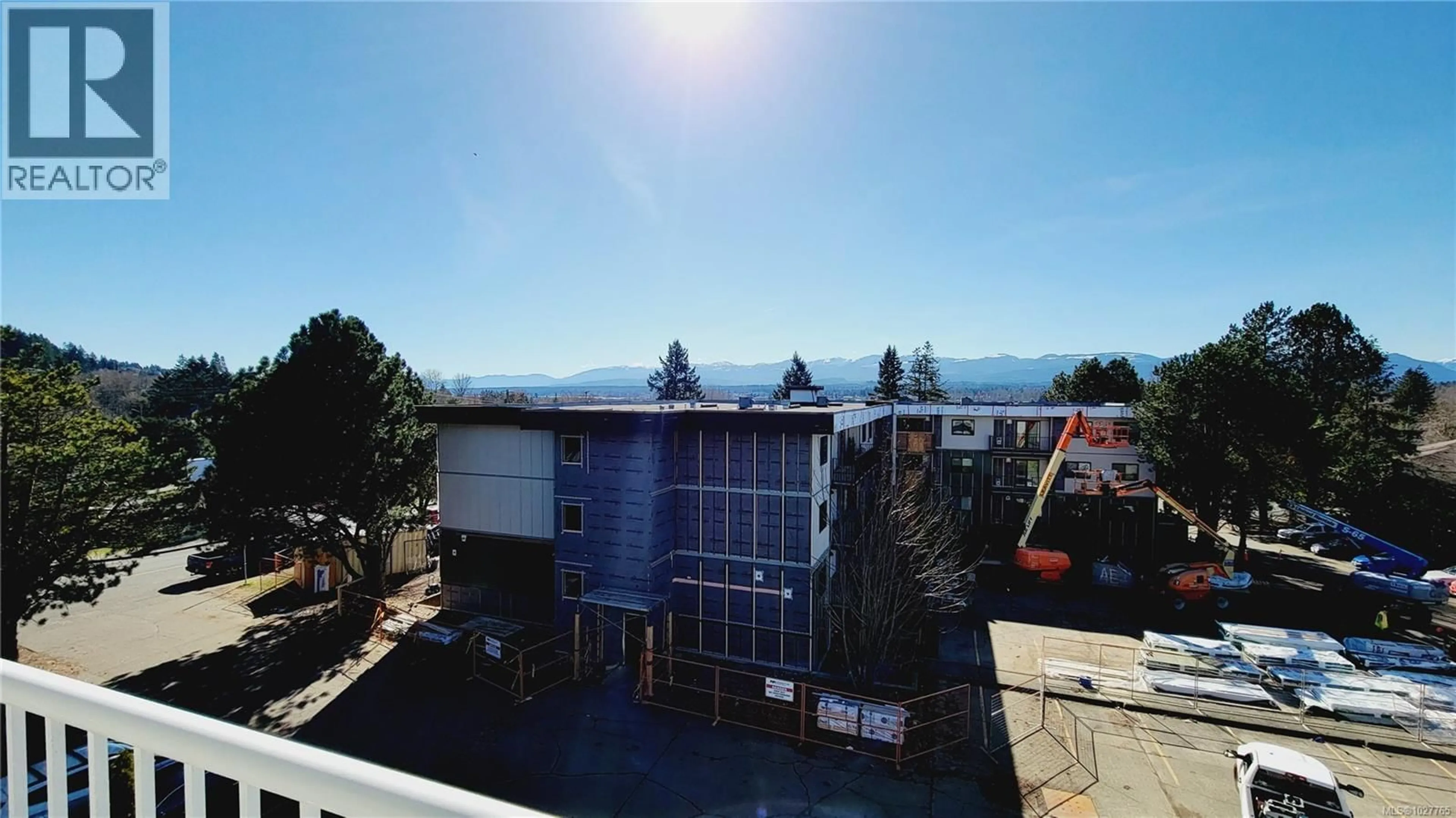 A pic from outside/outdoor area/front of a property/back of a property/a pic from drone, mountain view for 401 - 175 CENTENNIAL DRIVE, Courtenay British Columbia V9N7M4