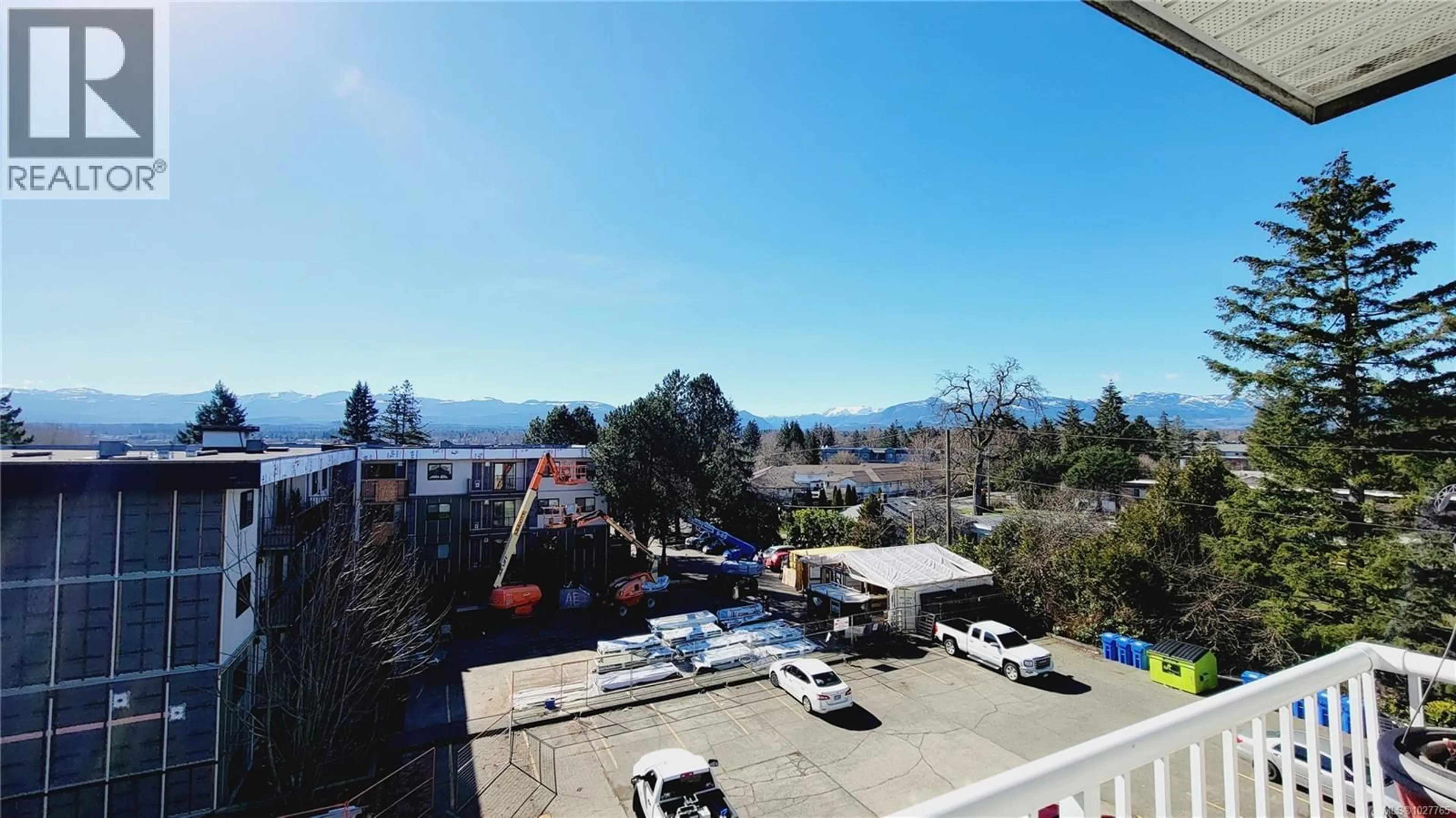 A pic from outside/outdoor area/front of a property/back of a property/a pic from drone, mountain view for 401 - 175 CENTENNIAL DRIVE, Courtenay British Columbia V9N7M4