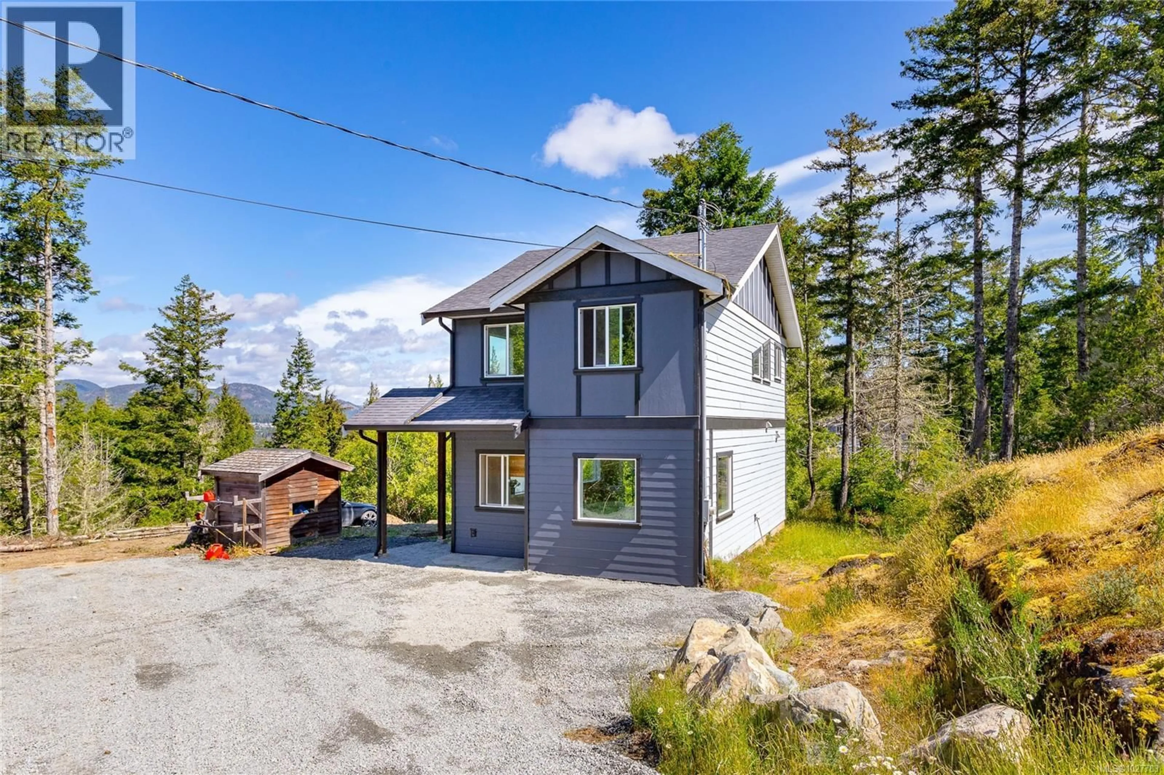A pic from outside/outdoor area/front of a property/back of a property/a pic from drone, unknown for 1695 COLE ROAD, Sooke British Columbia V9Z1A7