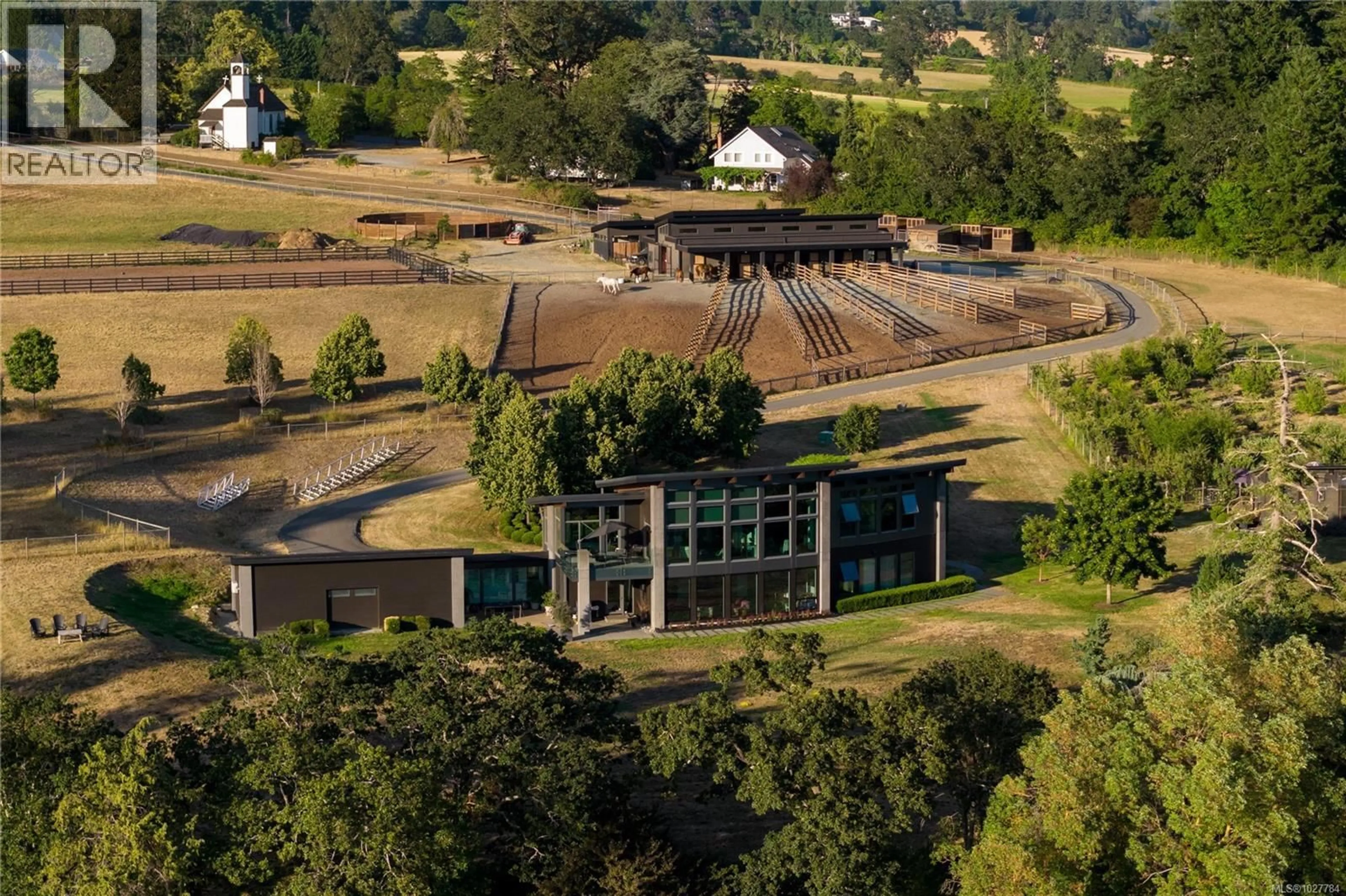 A pic from outside/outdoor area/front of a property/back of a property/a pic from drone, mountain view for 7756 WEST SAANICH ROAD, Central Saanich British Columbia V8M1R8
