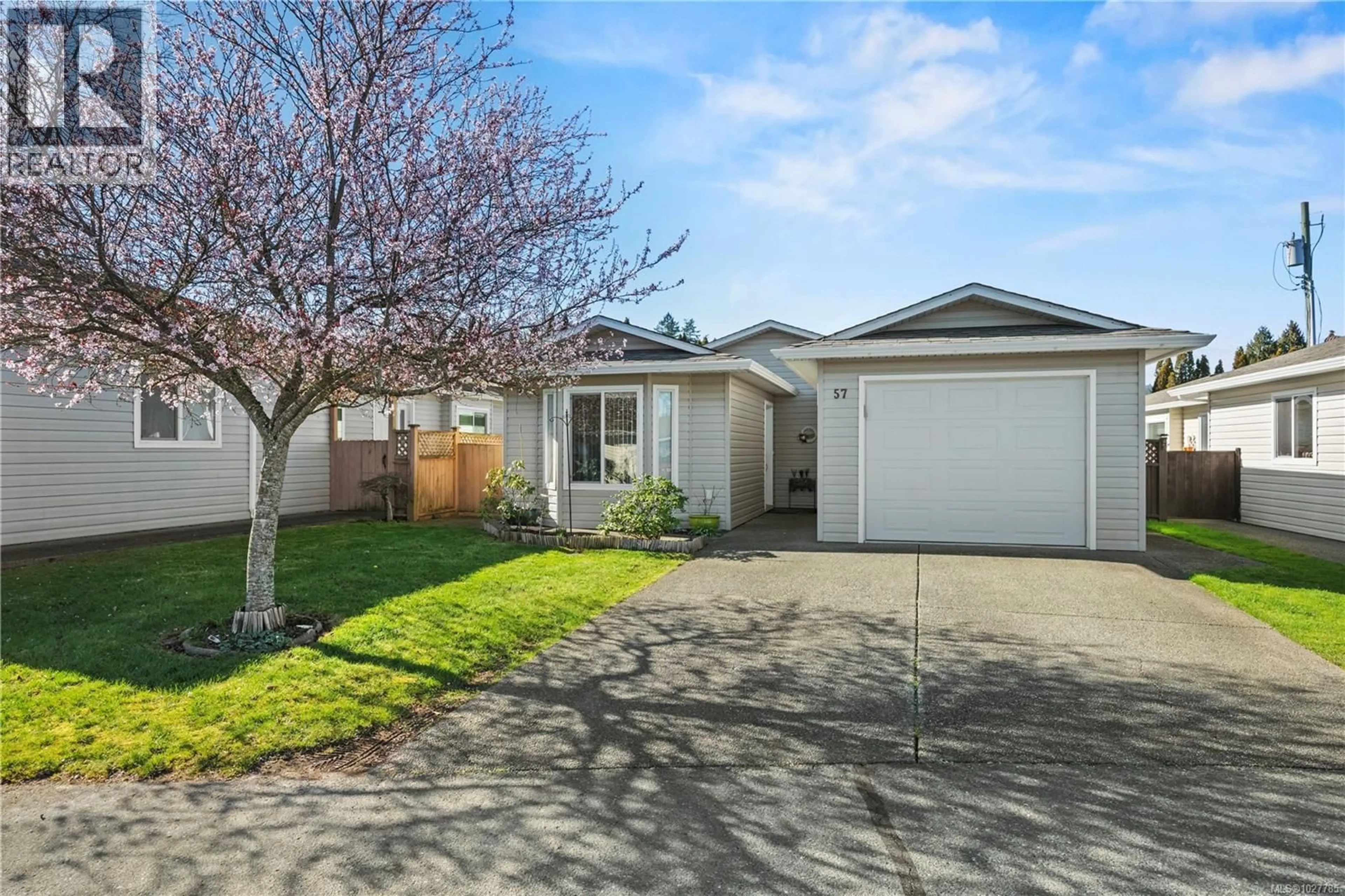 Home with vinyl exterior material, street for 57 - 7570 TETAYUT ROAD, Central Saanich British Columbia V8M2H4