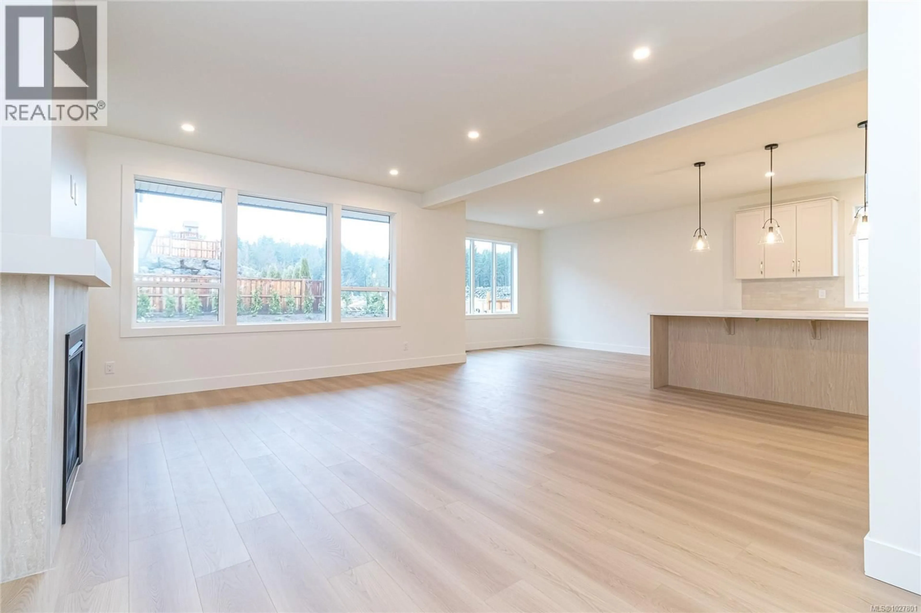 Open concept kitchen, wood/laminate floor for 2167 BELLFLOWER DRIVE, Langford British Columbia V9C0S6