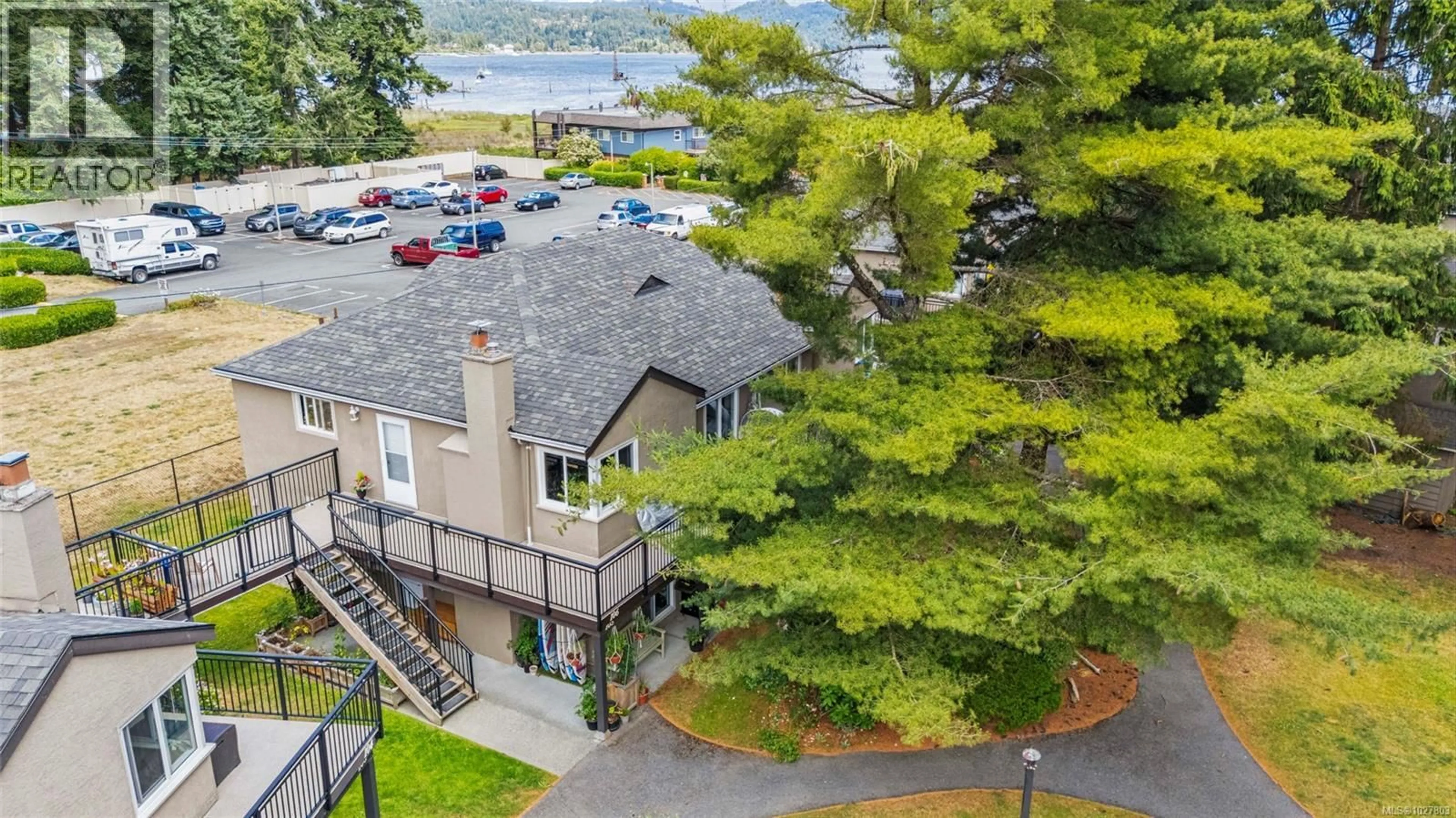 A pic from outside/outdoor area/front of a property/back of a property/a pic from drone, water/lake/river/ocean view for 106 - 1987 KALTASIN ROAD, Sooke British Columbia V9Z0B6