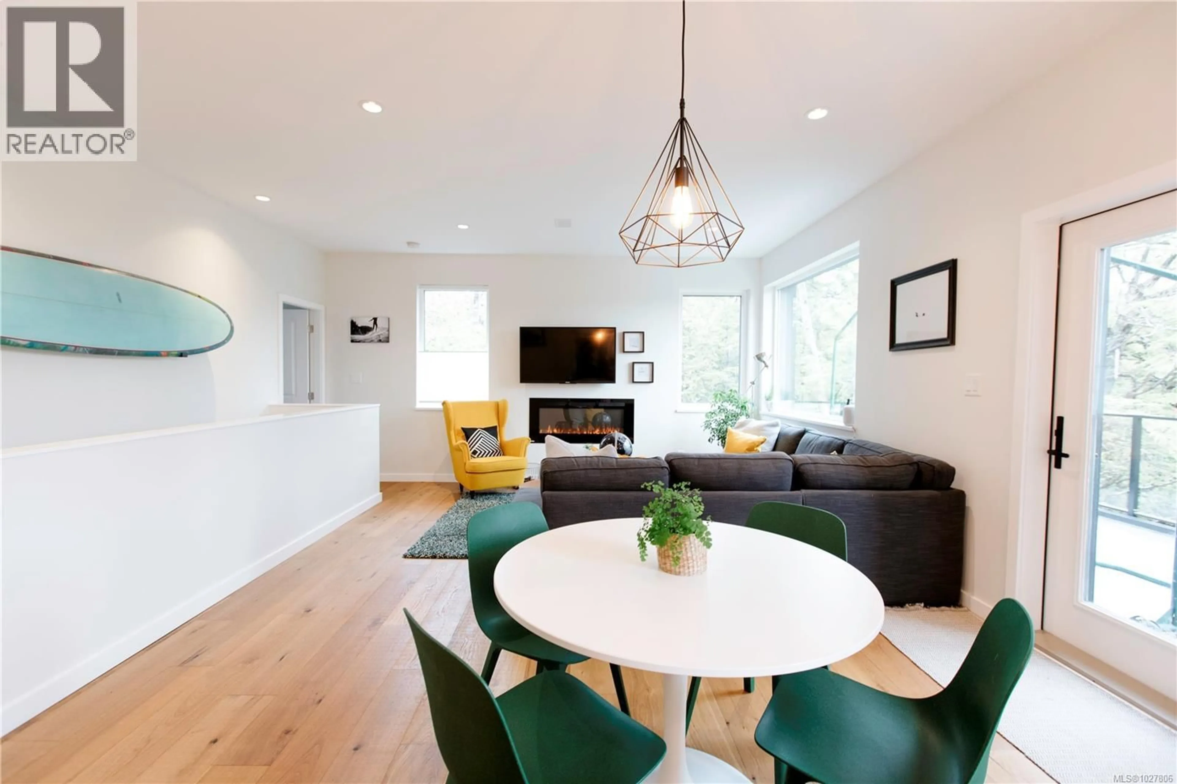 Living room with furniture, wood/laminate floor for 823 LORNE WHITE PLACE, Ucluelet British Columbia V0R3A0
