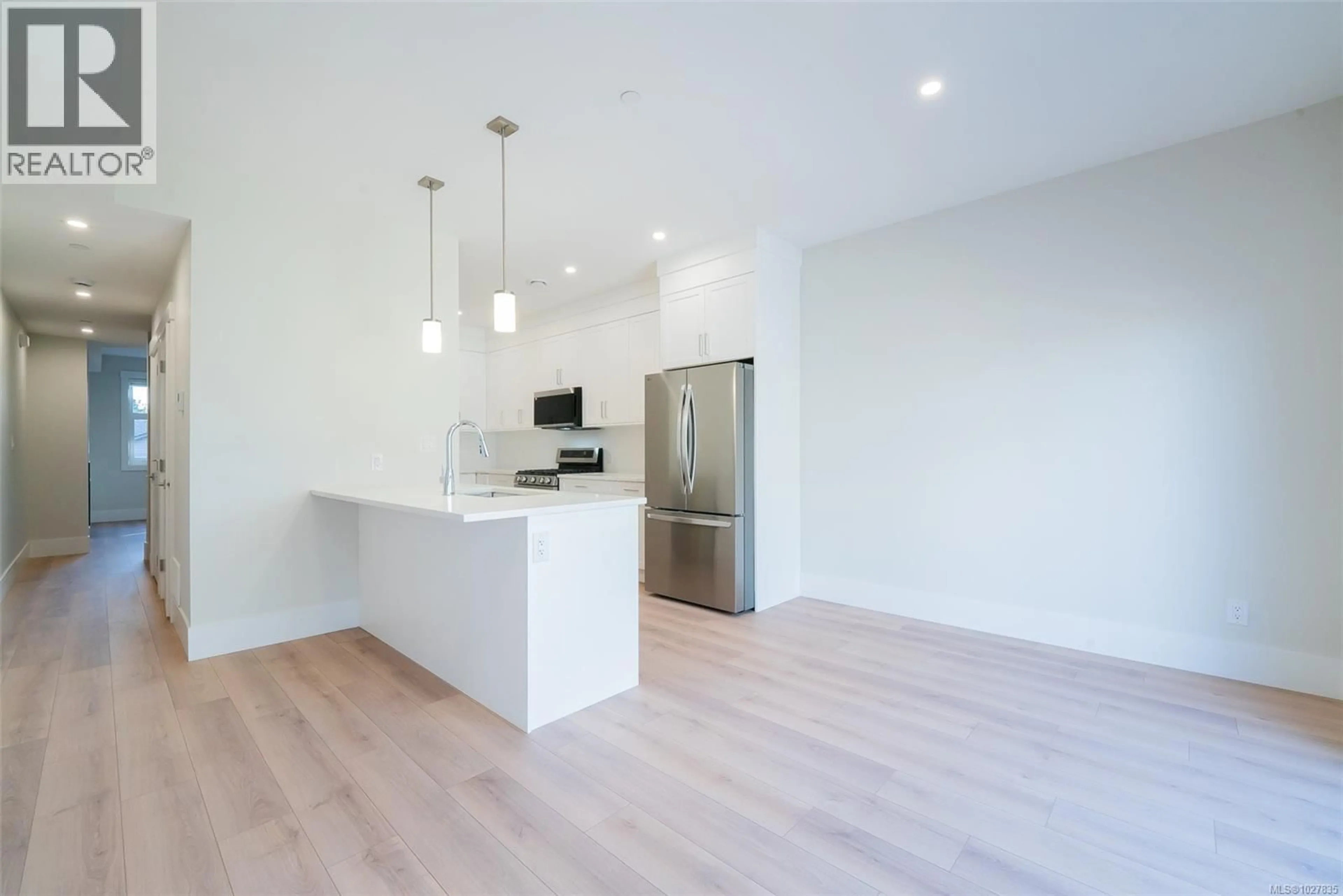 Open concept kitchen, wood/laminate floor for 109 - 1615 NORTHFIELD ROAD, Nanaimo British Columbia V9S5A8