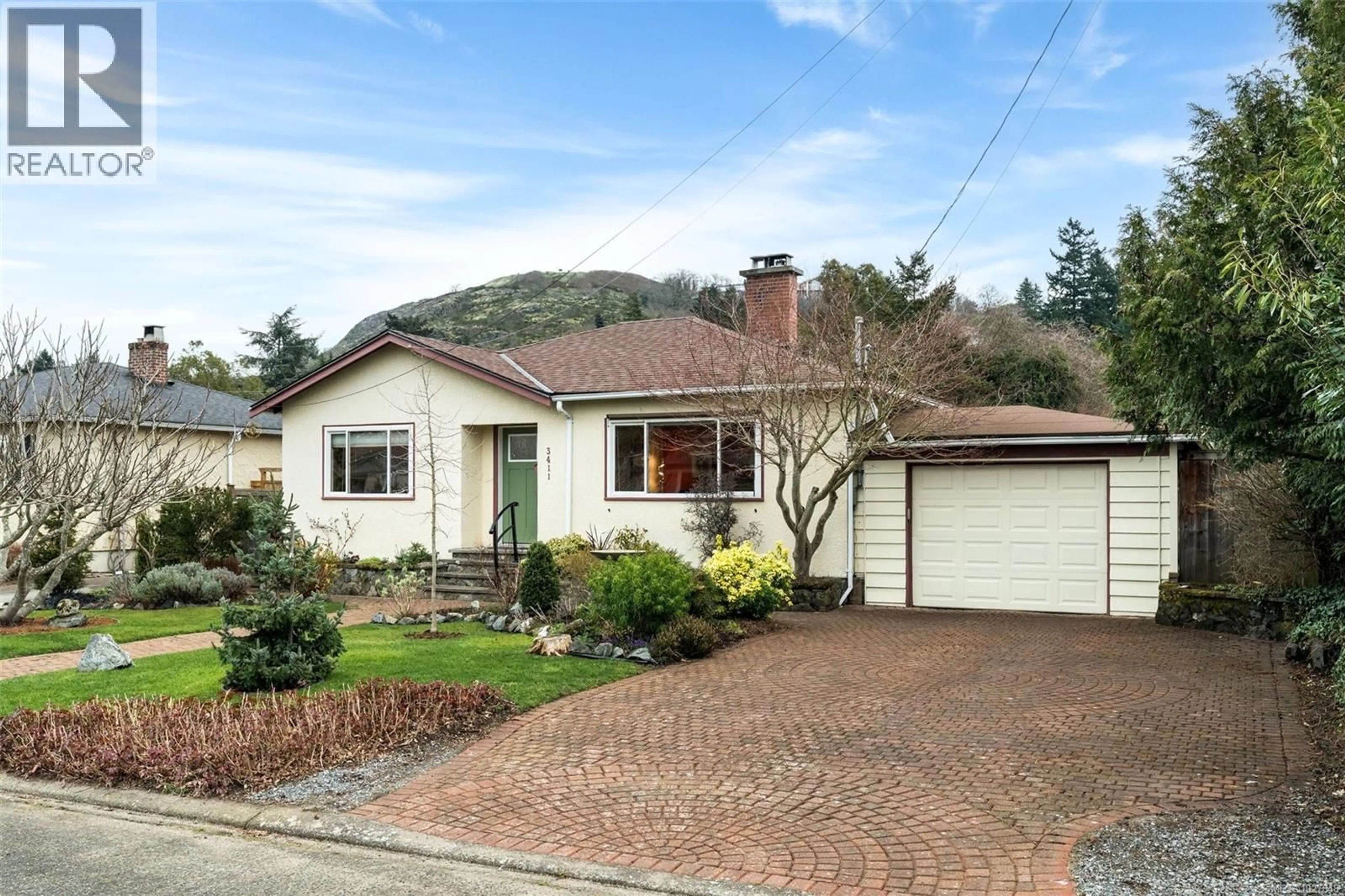 Home with brick exterior material, street for 3411 ST. MATTHEW STREET, Saanich British Columbia V8P4K4