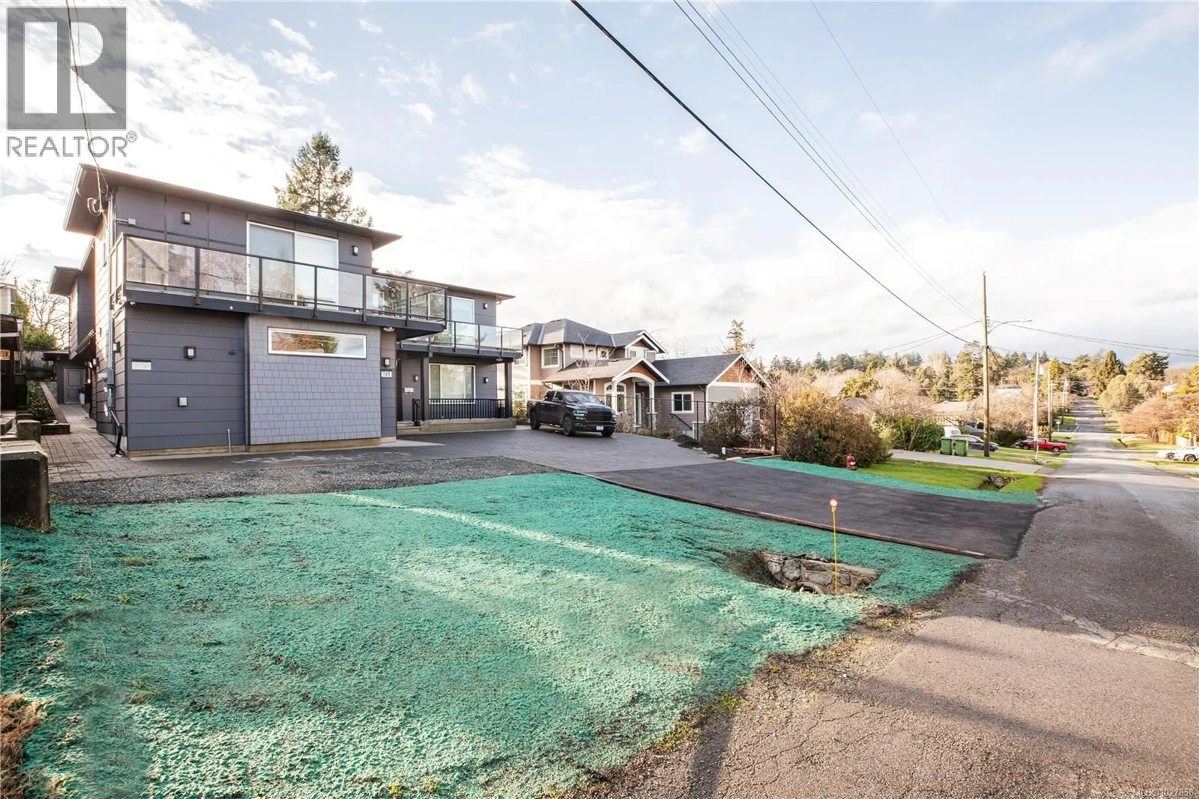 A pic from outside/outdoor area/front of a property/back of a property/a pic from drone, water/lake/river/ocean view for 741 SNOWDROP AVENUE, Saanich British Columbia V8Z2N3