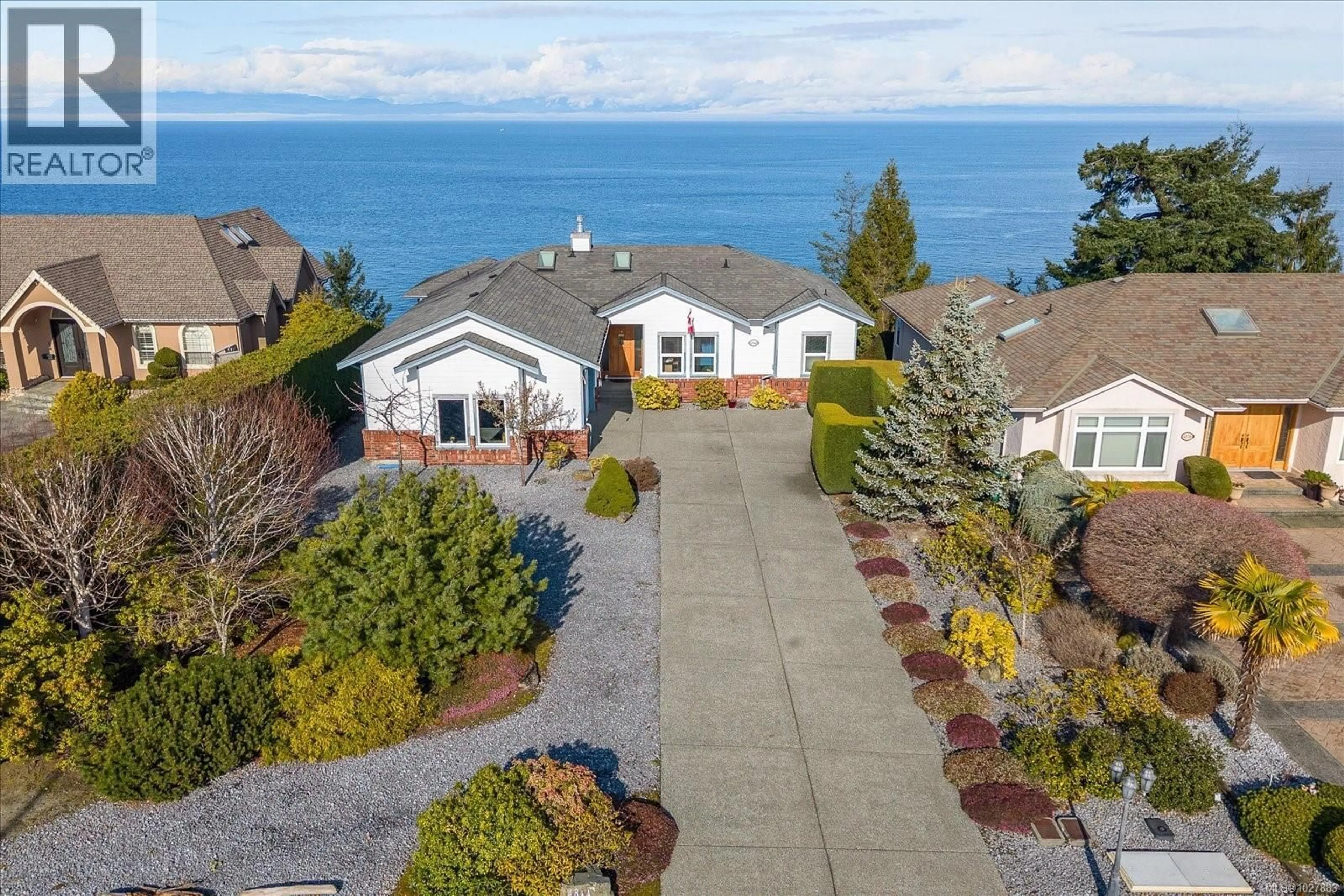 A pic from outside/outdoor area/front of a property/back of a property/a pic from drone, water/lake/river/ocean view for 4844 FILLINGER CRESCENT, Nanaimo British Columbia V9V1K1