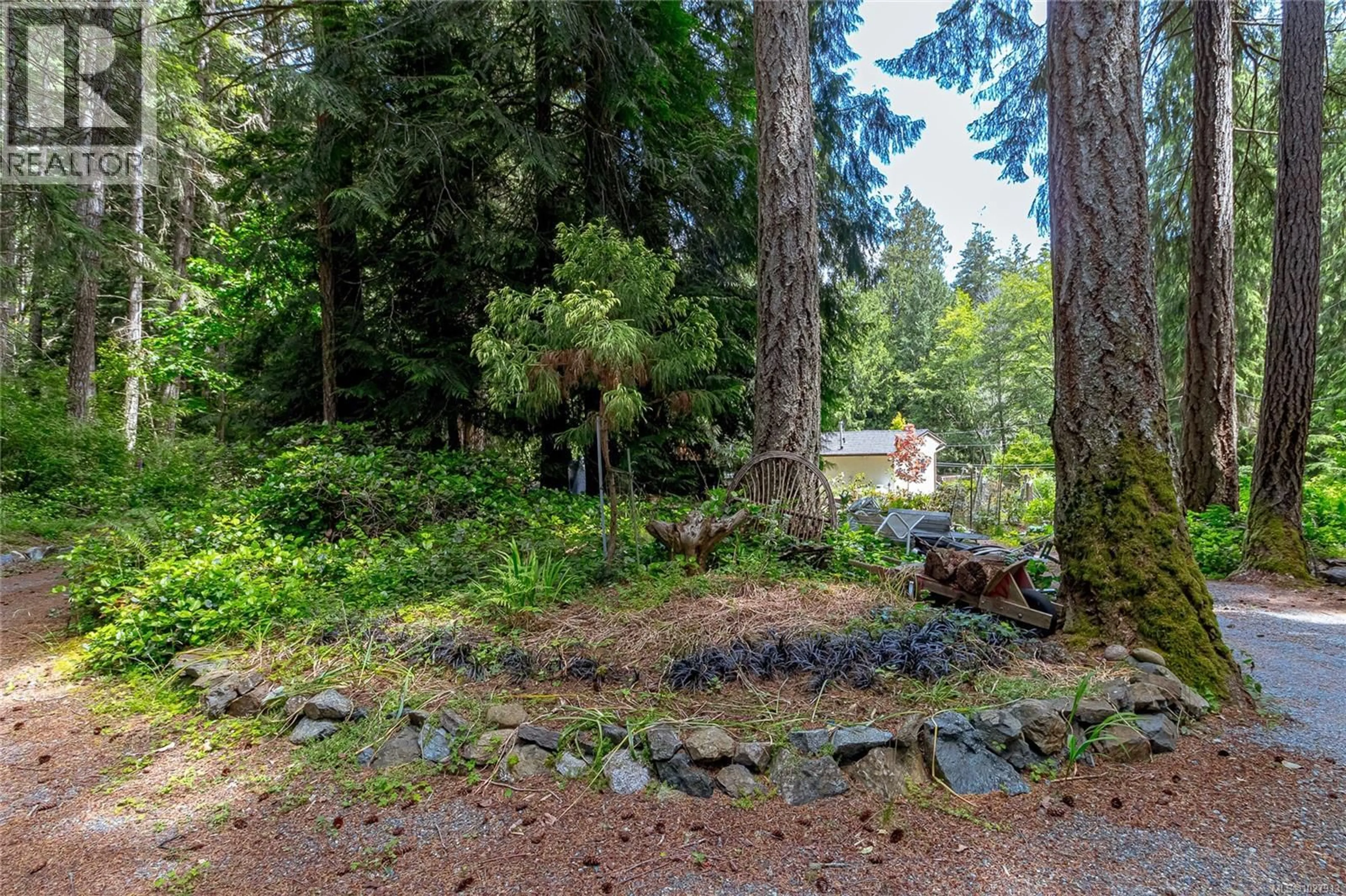 A pic from outside/outdoor area/front of a property/back of a property/a pic from drone, forest/trees view for 1425 TODD LANE, Metchosin British Columbia V9C0A5