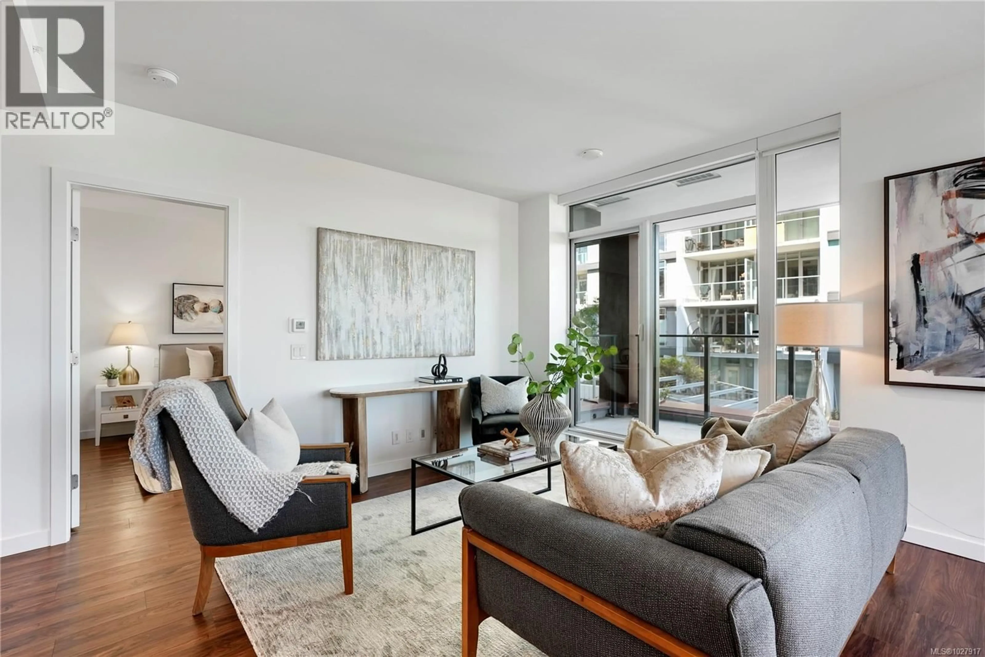 Living room with furniture, unknown for 201 - 369 TYEE ROAD, Victoria British Columbia V9A0B6