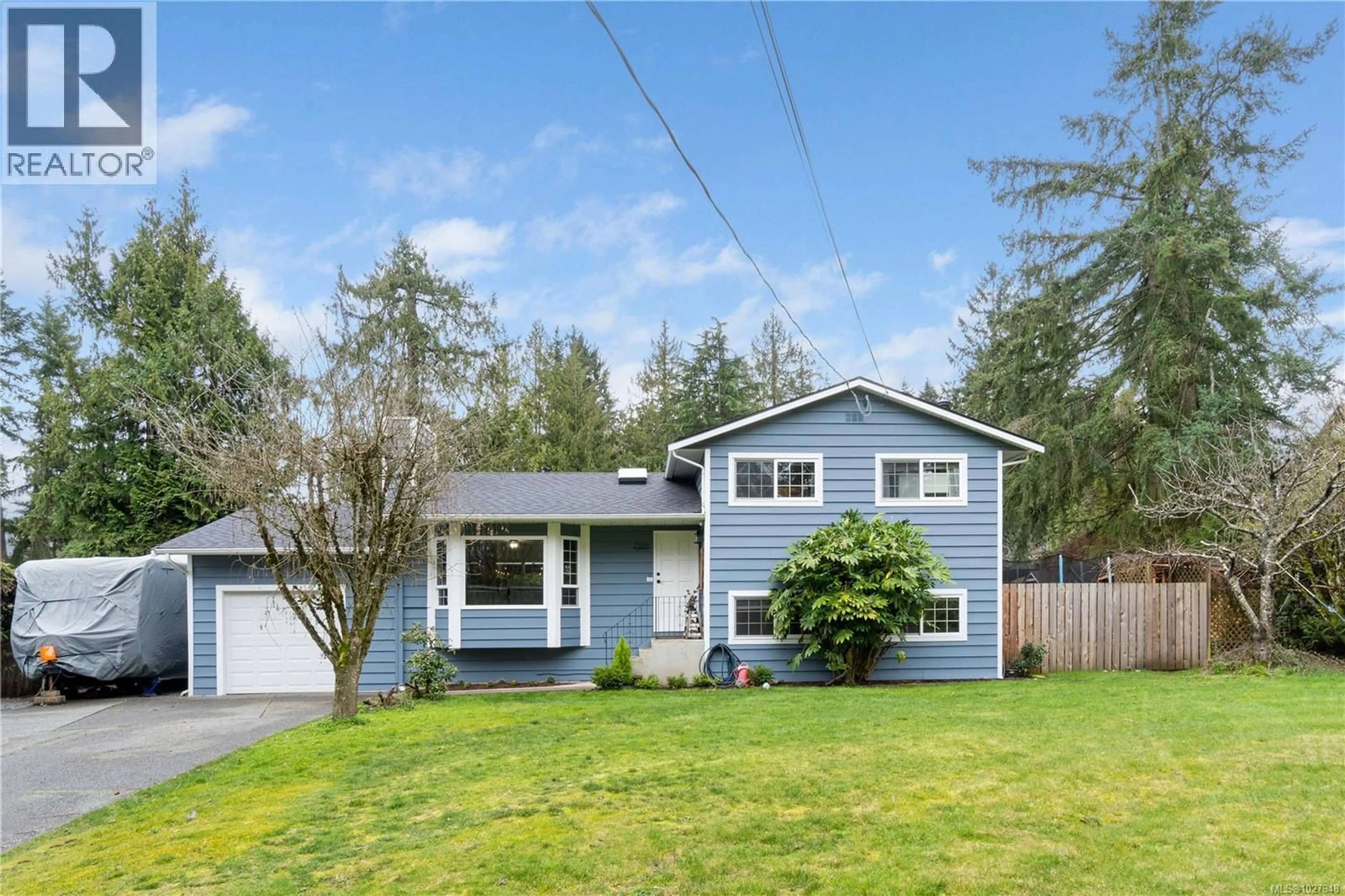 Home with vinyl exterior material, street for 7509 HARBY ROAD, Lantzville British Columbia V0R2H0