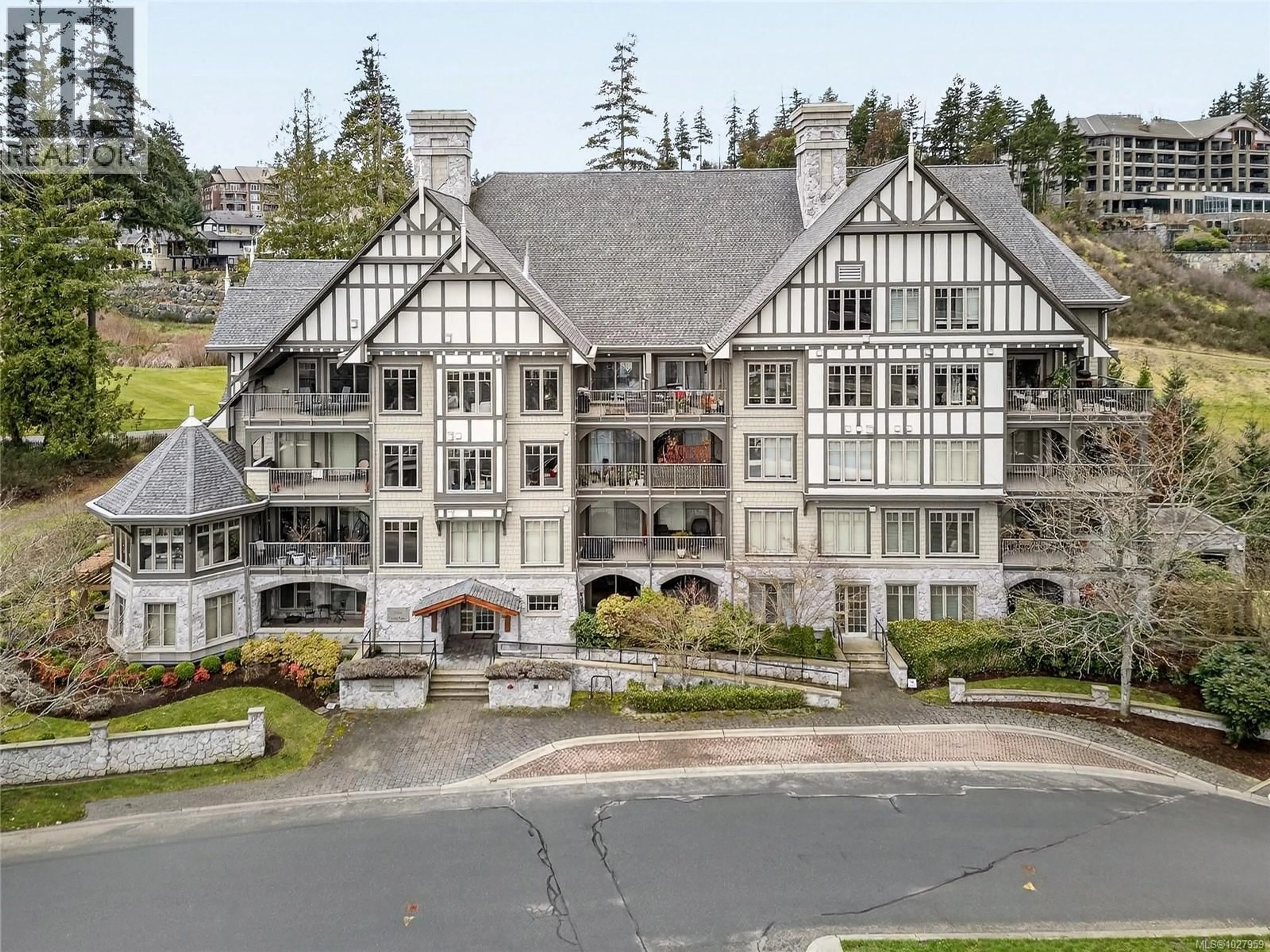 A pic from outside/outdoor area/front of a property/back of a property/a pic from drone, unknown for 106 - 2006 TROON COURT, Langford British Columbia V9B6T4