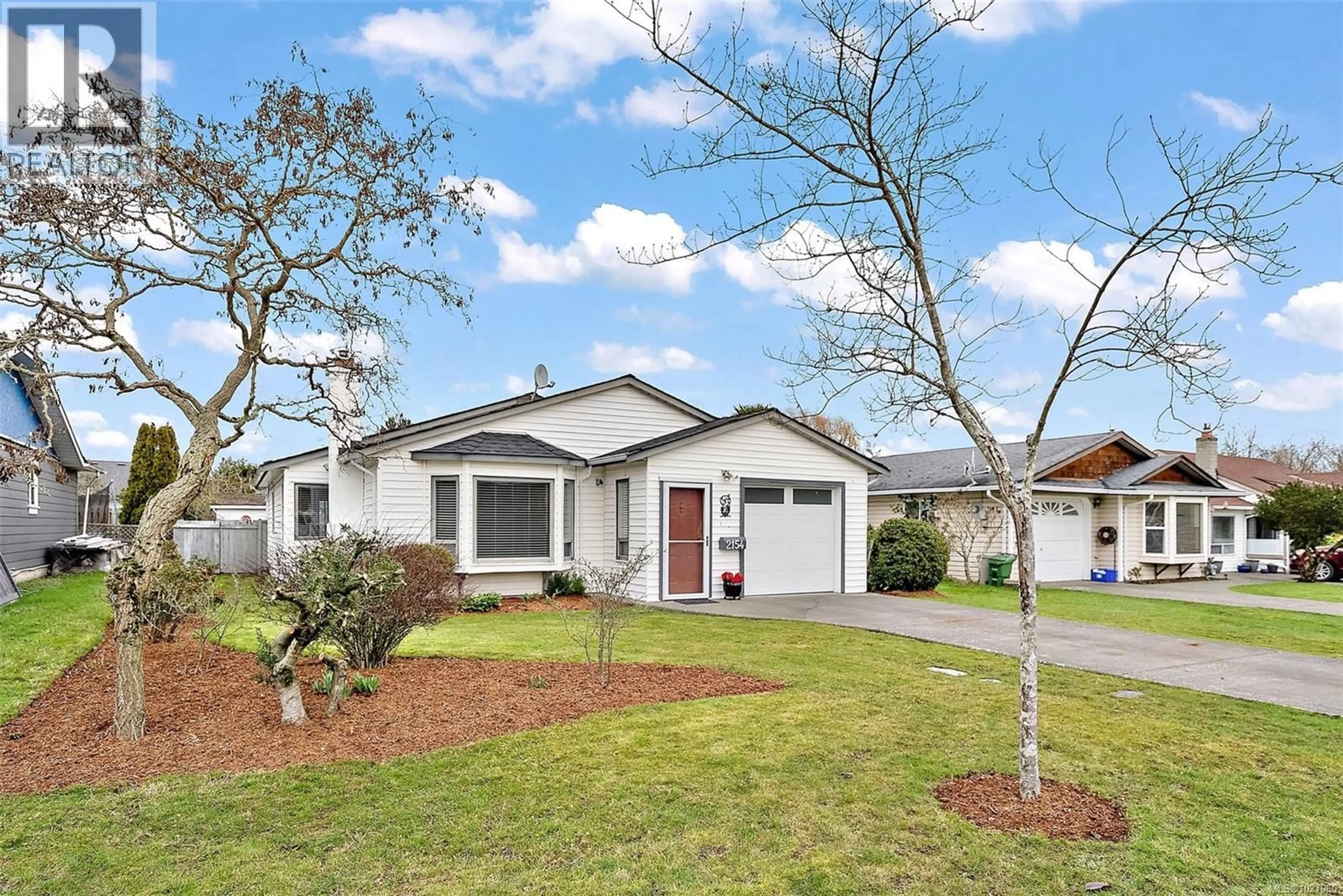 Home with vinyl exterior material, street for 2154 JAHN PLACE, Sidney British Columbia V8L5C1