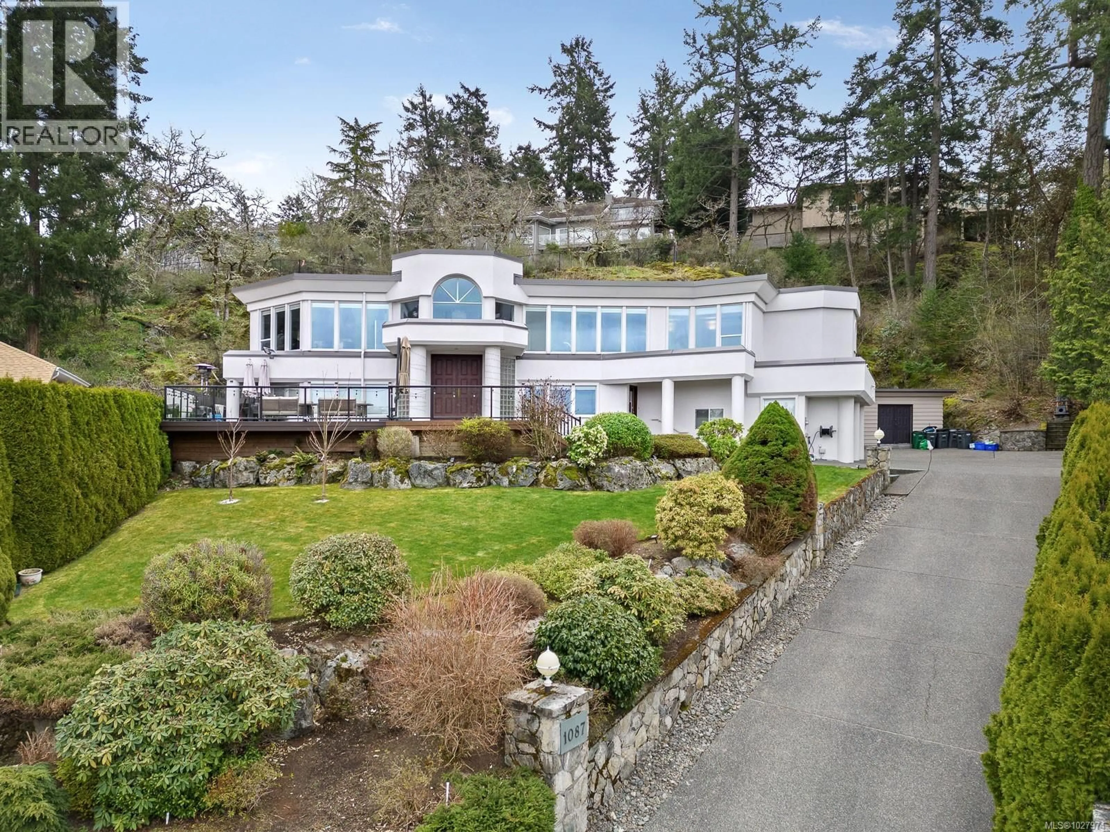 A pic from outside/outdoor area/front of a property/back of a property/a pic from drone, unknown for 1087 TOTEMWOOD LANE, Saanich British Columbia V8X5E3