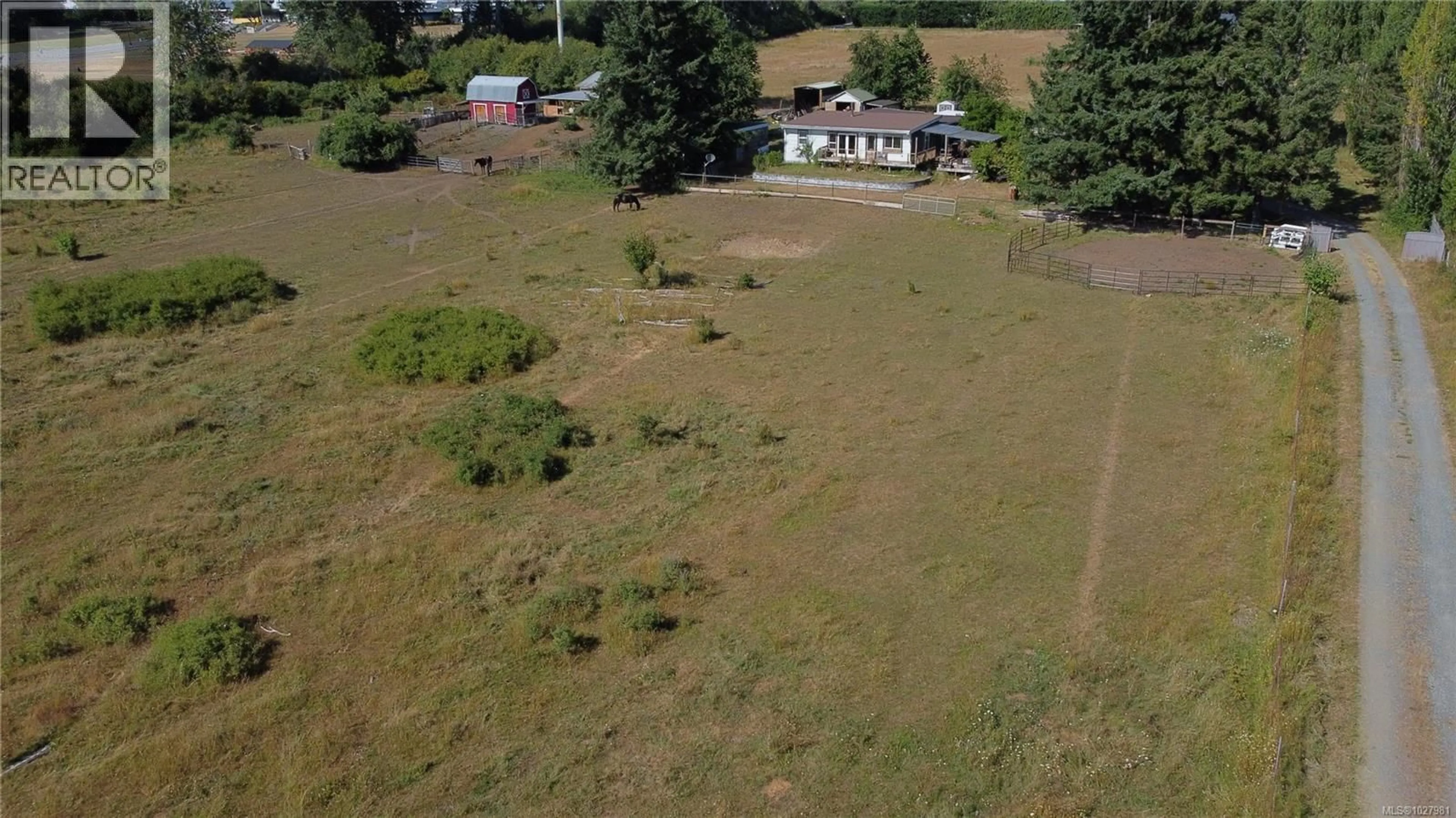 A pic from outside/outdoor area/front of a property/back of a property/a pic from drone, unknown for 4766 HEADQUARTERS ROAD, Courtenay British Columbia V9N9H4