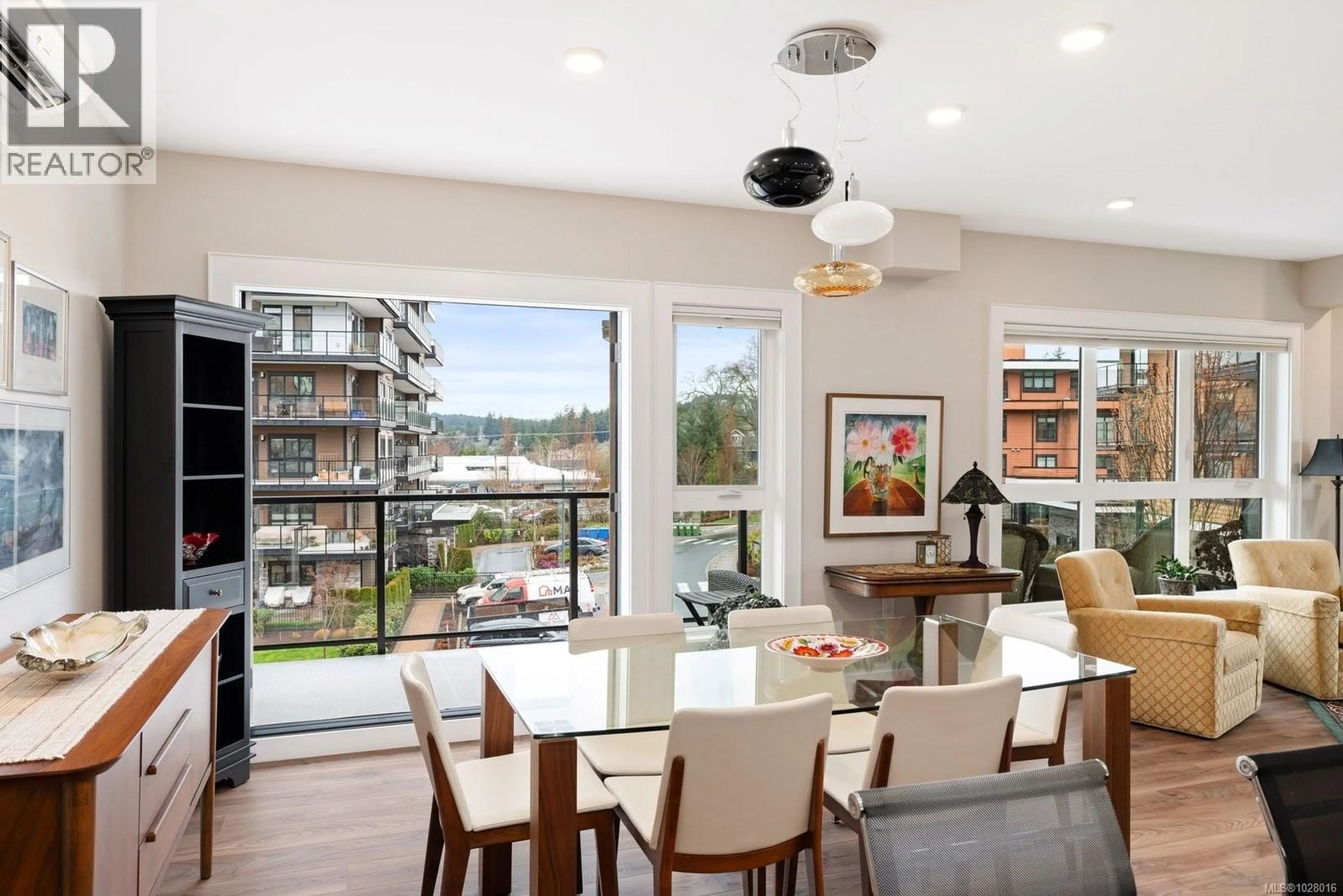 Dining room, wood/laminate floor for 309 - 747 TRAVINO LANE, Saanich British Columbia V8Z0E4