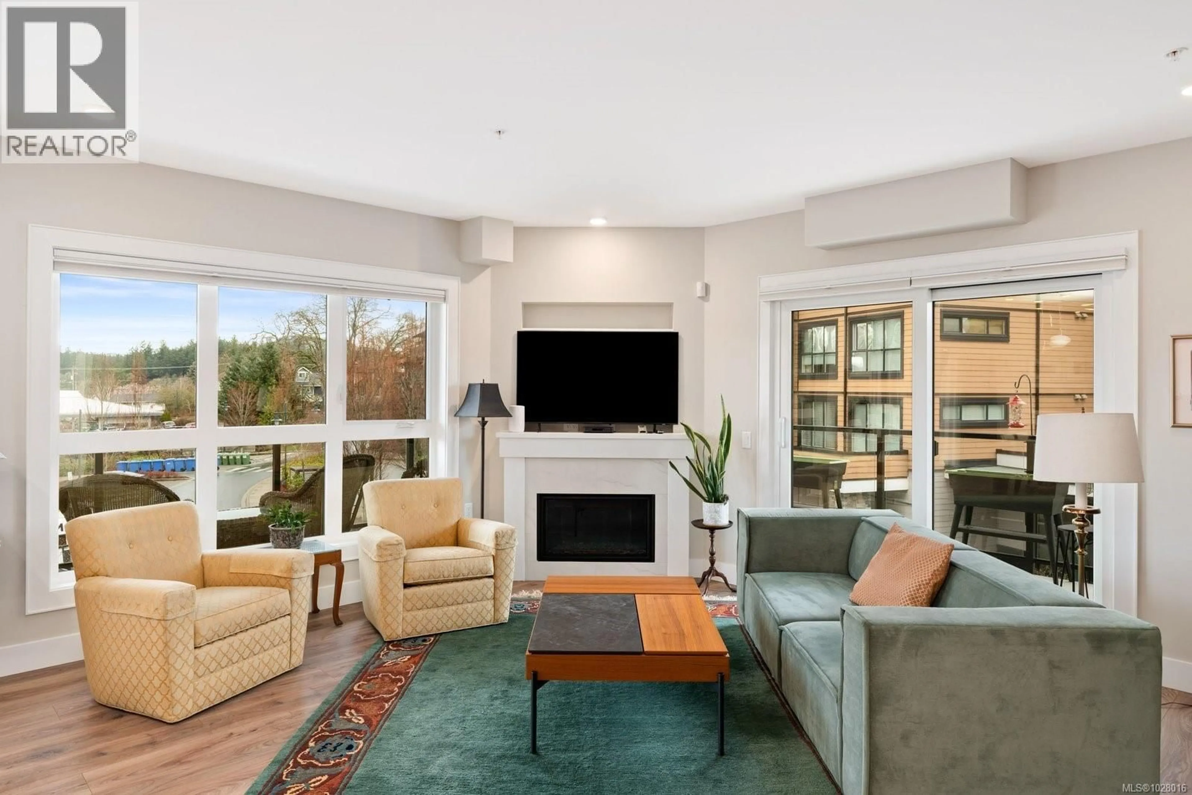 Living room with furniture, unknown for 309 - 747 TRAVINO LANE, Saanich British Columbia V8Z0E4