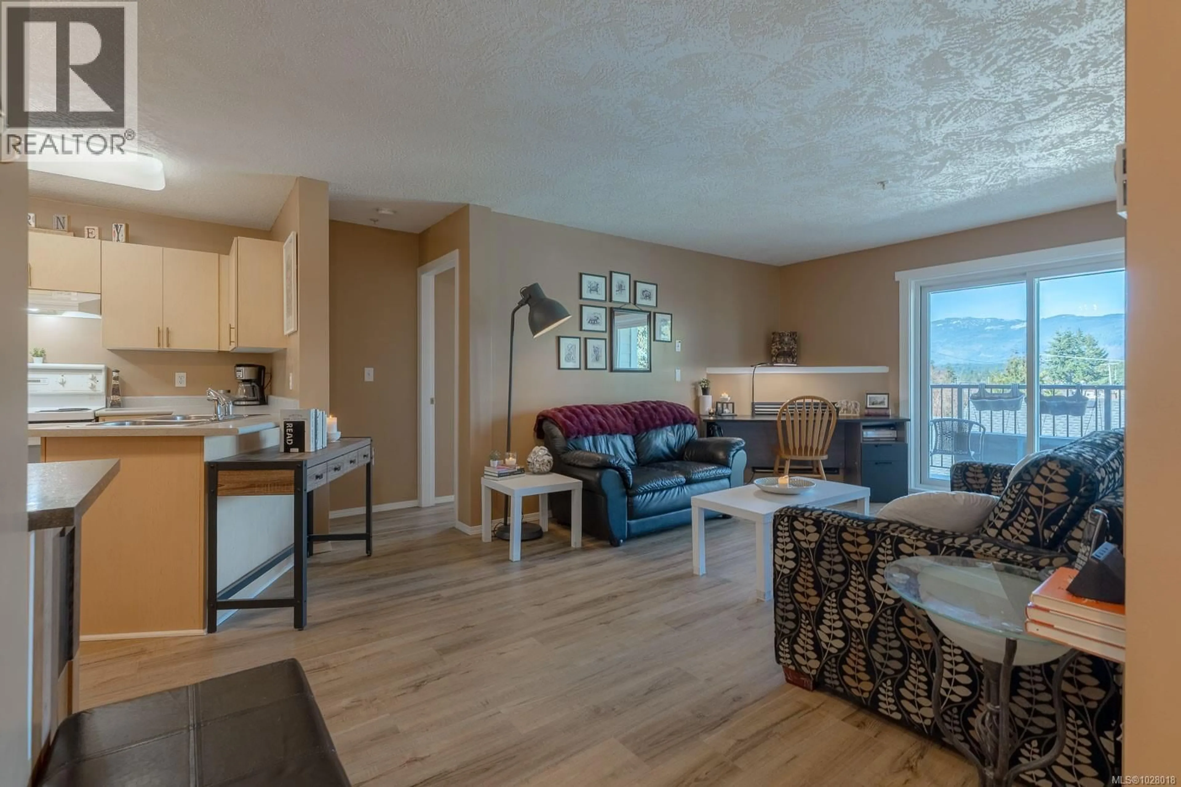 Living room with furniture, wood/laminate floor for 308 - 3855 11TH AVENUE, Port Alberni British Columbia V9Y4Z2