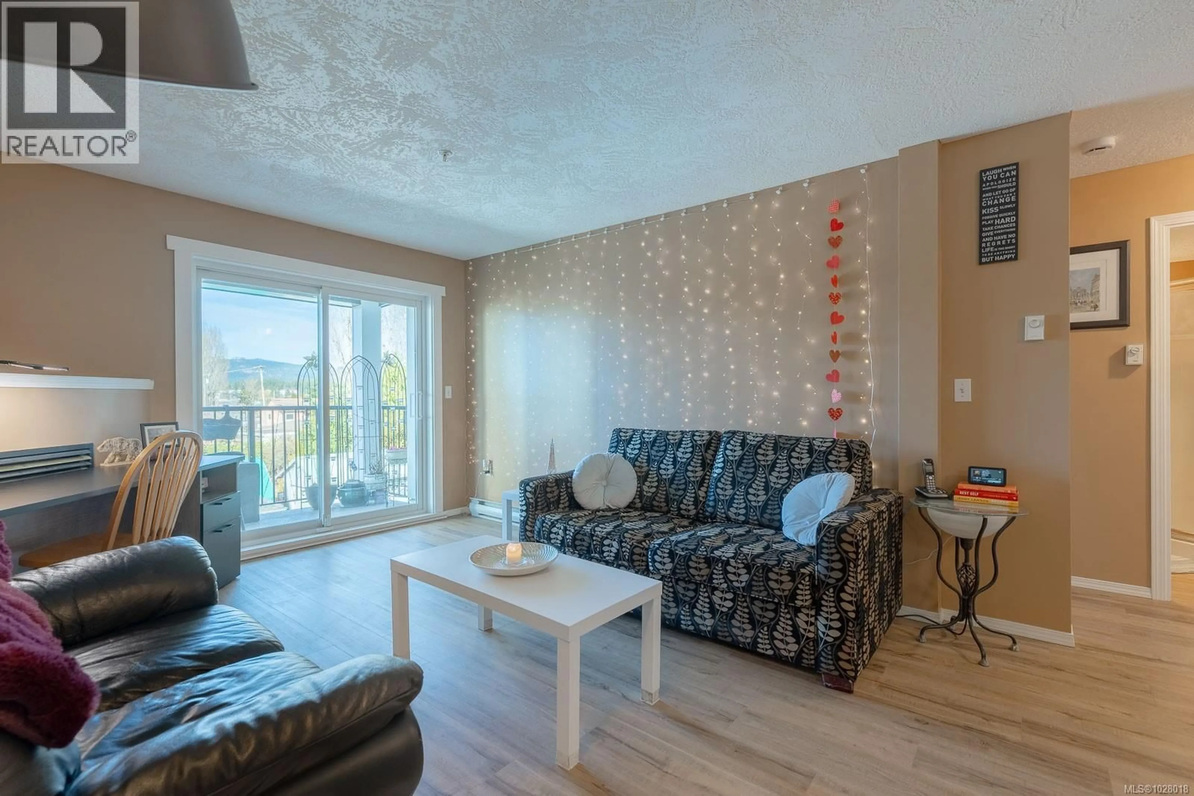 Living room with furniture, wood/laminate floor for 308 - 3855 11TH AVENUE, Port Alberni British Columbia V9Y4Z2